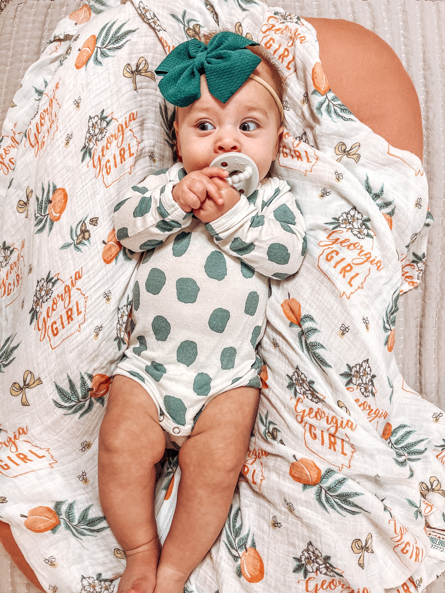 the softest swaddle from little home town.com & spearmint love baby polka dot long sleeve onesie in snuggle me lounger and ryan & rose flat cutie pat pacifier🎀💙🍑

#LTKfit #LTKkids #LTKbaby