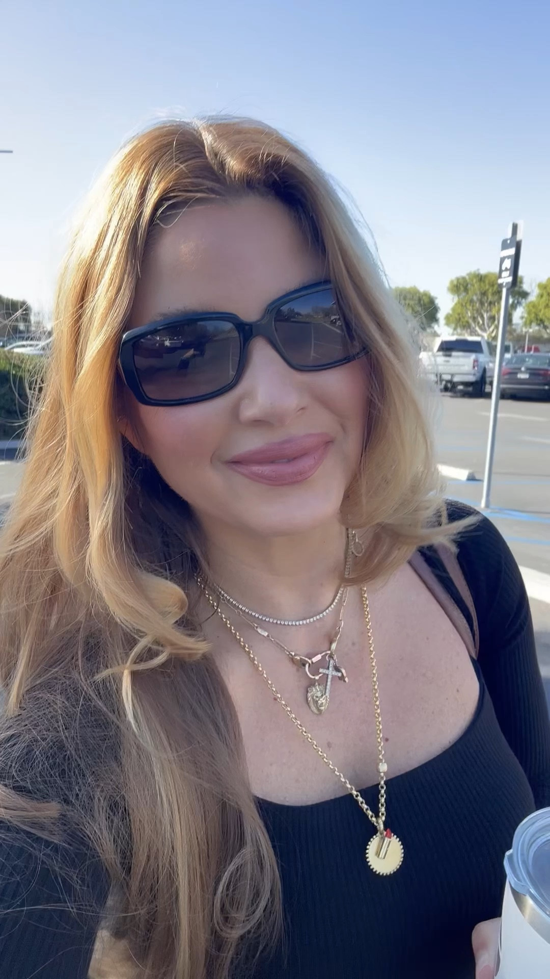 Black body suit, trousers, sandals, work wear, sunglasses, hot rollers, nude lips 

Bodysuit (lined/padded so you can skip a bra with confidence)-M
Trousers-4
Lip color-red nude + LA
Blush-apple blossom 

#LTKbeauty #LTKGiftGuide #LTKSeasonal