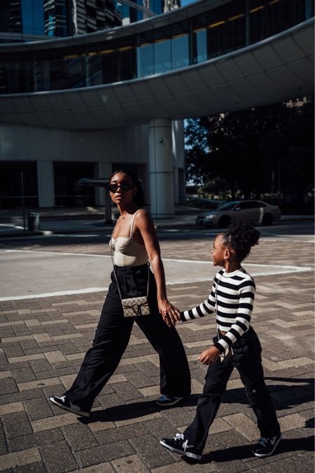 Family photos - Mommy and me fall style inspo: girls cargo pants and stripe sweater, and Nike dunks sneakers. Abercrombie trousers and found a dupe to my bodysuit in black paired with Jordan sneakers and Gucci mini bag

#LTKstyletip #LTKfamily #LTKkids