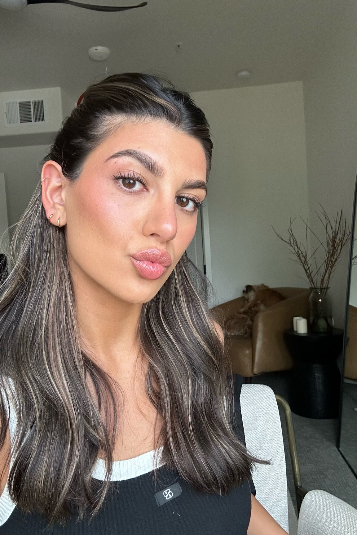 Full makeup routine 

1. saie - sunglow 
2. Charlotte - 7 neutral 
3. Dose of colors - medium 3
4. Fenty - caramel cutie
5. Lux - tropics 
6. Kosas - hype
7. Lux - sunset
8. Dior - dark brown
9. Loreal - one shade
10. Sephora - nothin but nude
11. Saie - bounce
12. Milani - setting spray