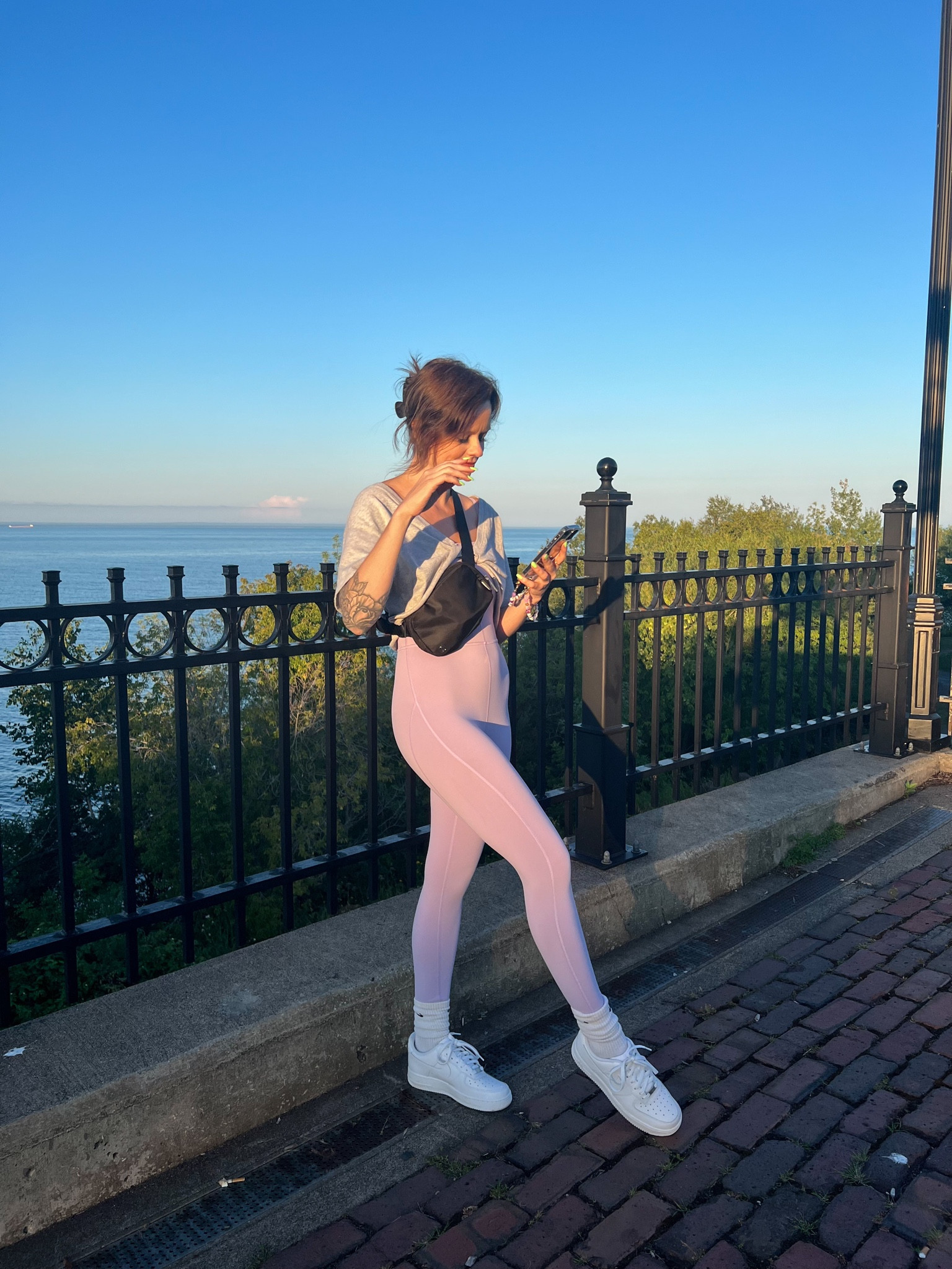 Casual athleisure 
Aritzia jumpsuit
Lululemon 
Crossbody bag 
Nike 
Air Force 1 
Aerie Tee 

#LTKfit #LTKshoecrush #LTKunder100