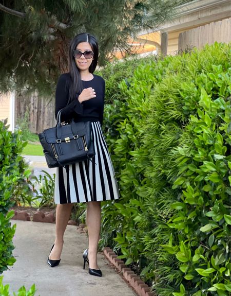 Wore a simple black and white look to work! I was looking for a black work bag however, it was staring me in the face the whole time! I no longer wear big bags on a daily basis so I transitioned my 3.1 Phillip Lim Pashli to my workwear. 

#LTKworkwear #LTKstyletip #LTKFind