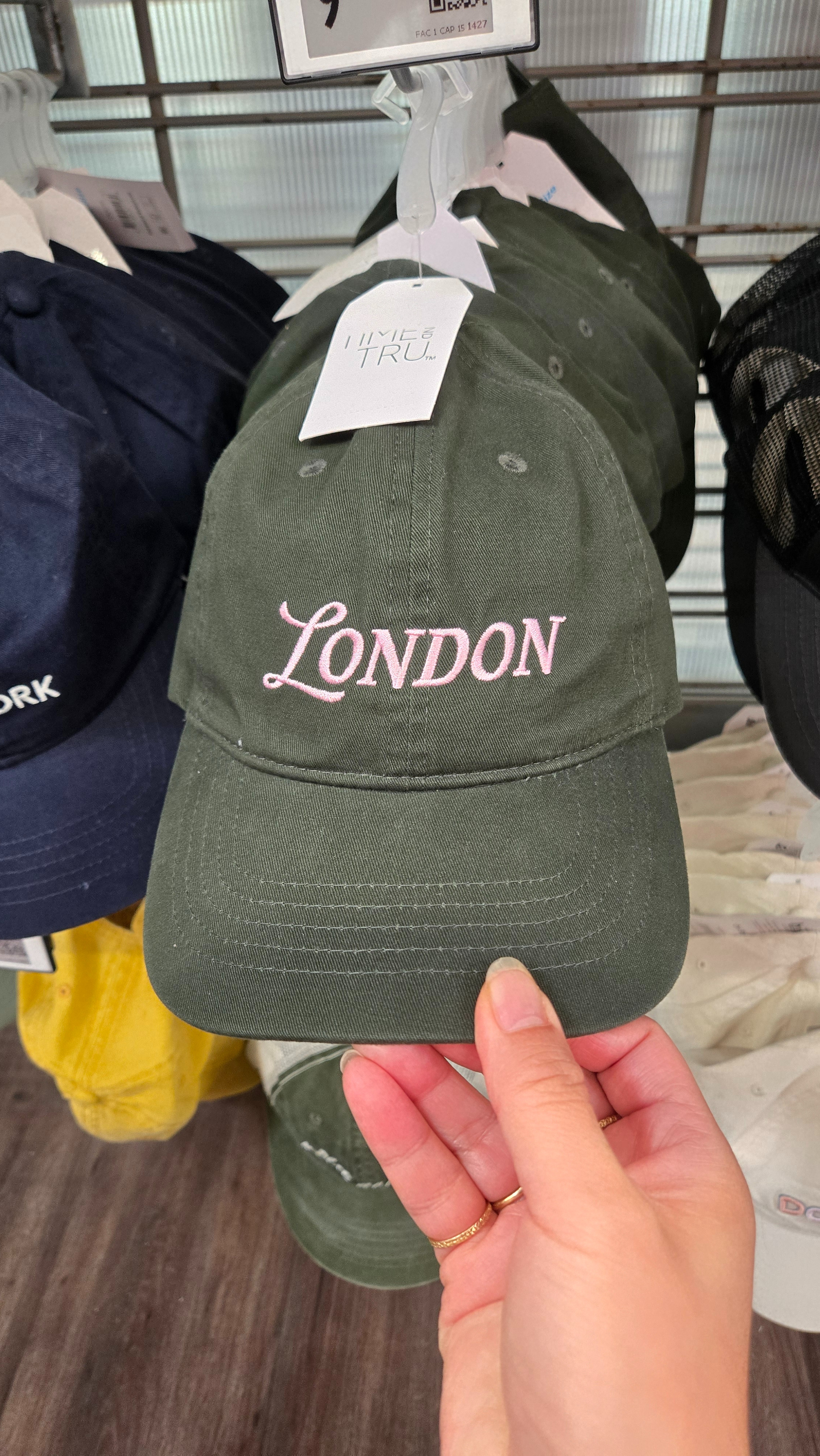 forest green baseball cap with "london" written in pink, walmart, perfect with fall outfits 

 #LTKmomlife #LTKSeasonal #LTKOver40