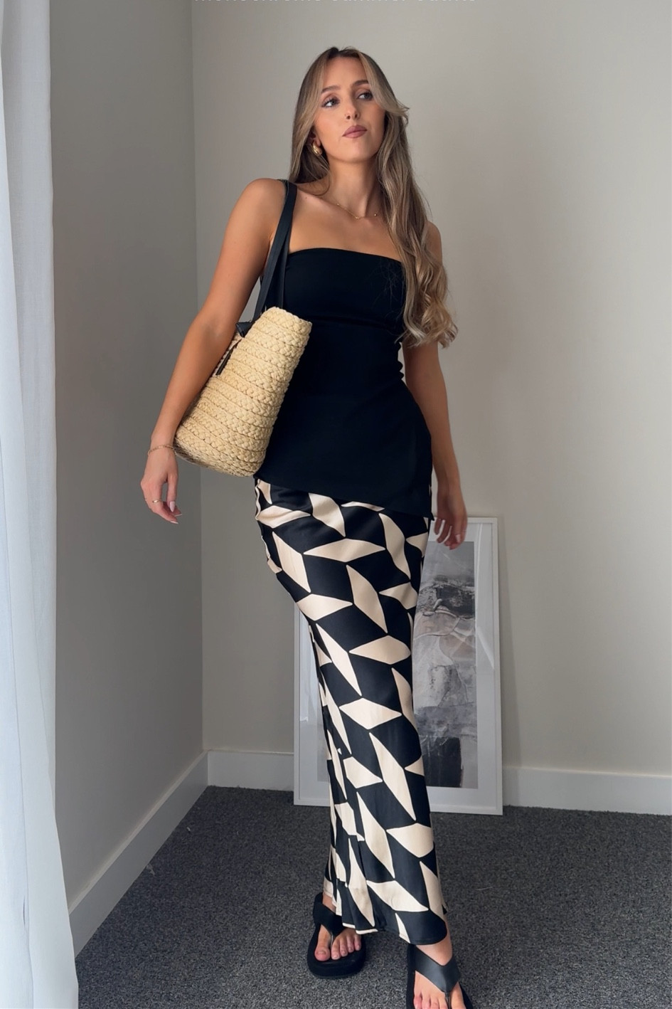 Minimalist summer outfit styling a patterned satin maxi skirt 

#LTKsummer #LTKstyletip #LTKuk
