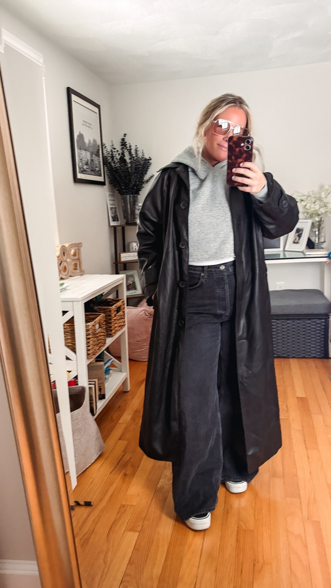 Winter to Spring outfit
Weekend look 
Long leather trench 
Black wide leg denim 
Cropped gray hoodie 
Light retro sunglasses 
Platform vans 

#LTKSeasonal #LTKSaleAlert #LTKootd