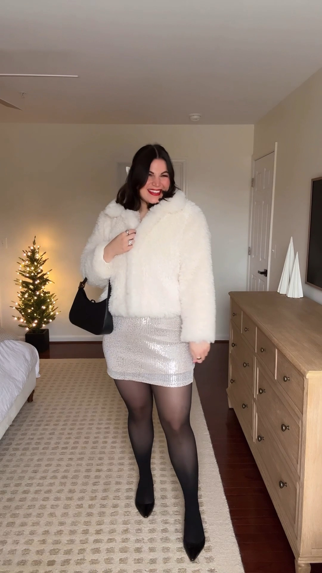 Midsize holiday outfit idea from @maurices Can’t stop won’t stop with the sequins this holiday season! And even though this sequin skirt is a mini length it actually still works so well for me at 5’10”! 

Robe - xl 
Tights - xl
Skirt - large 
Sweater - large (wish I went with an xl) 
Coat - xl 
Heels - 9 

#LTKTall #LTKMidsize #LTKHoliday