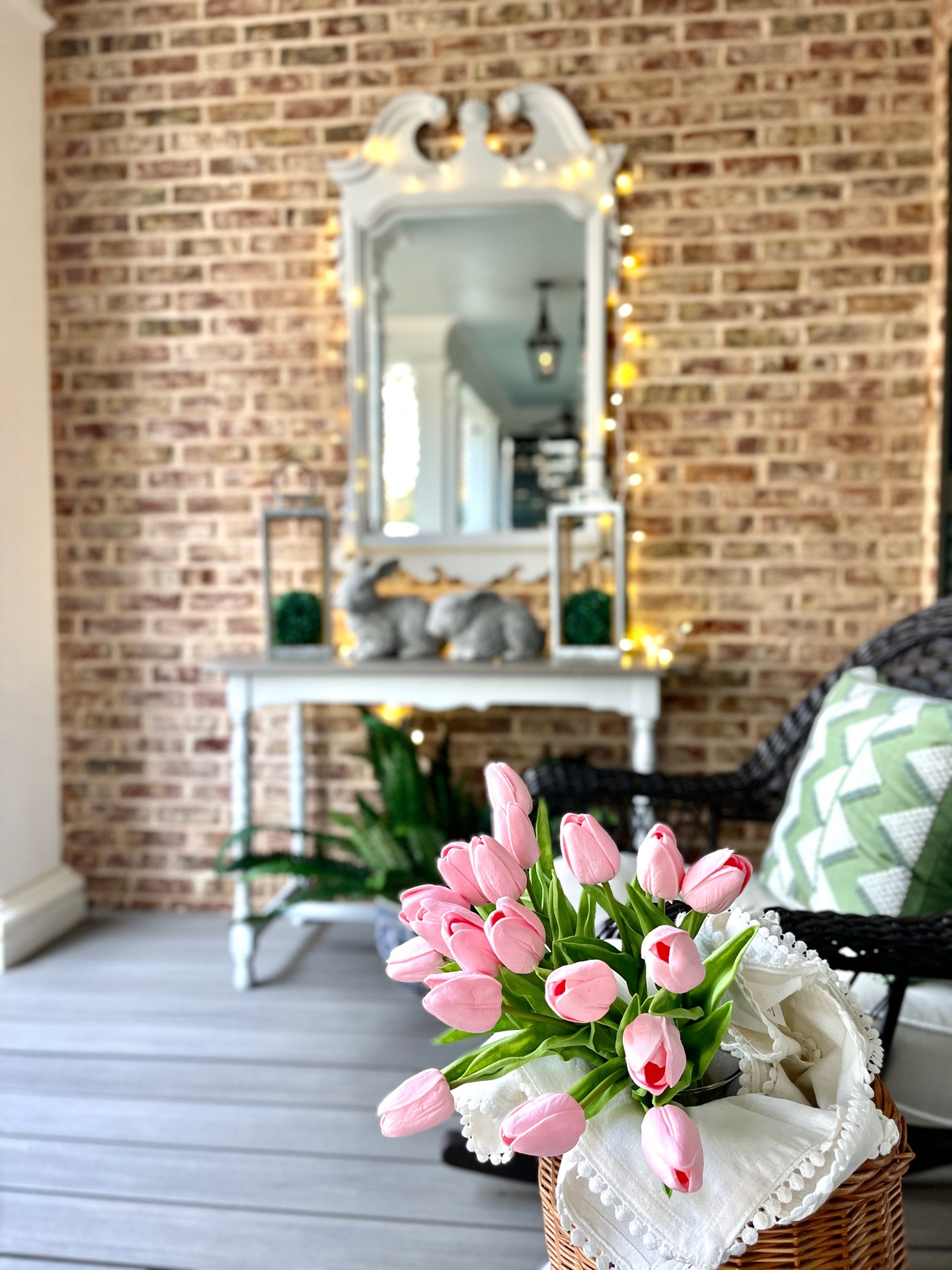Spring is in the air with these updates to our front porch! Resin wicker rockers with pops of blue and green with outdoor pillows and chinoiserie garden stool shine with the addition of faux ferns and tulips. #amazonhome #fauxfern #frontporch 

#LTKSeasonal #LTKhome #LTKstyletip