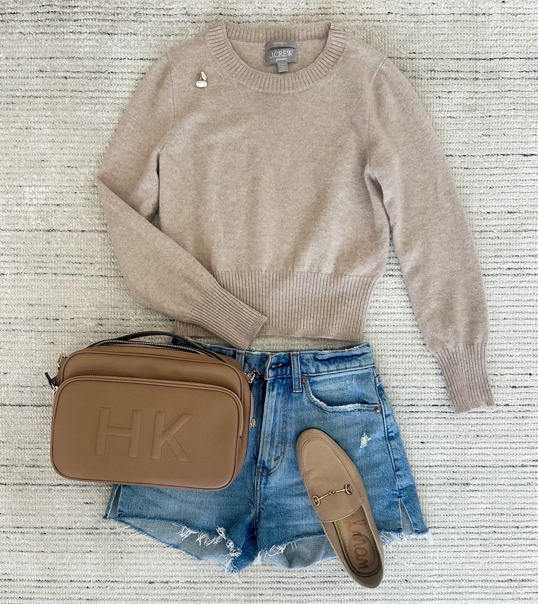 Summer transitioning to fall outfit with cashmere shrunken sweater, jean shorts and loafers for a chic look. Perfect for lunches and every day! 

#LTKSeasonal #LTKStyleTip