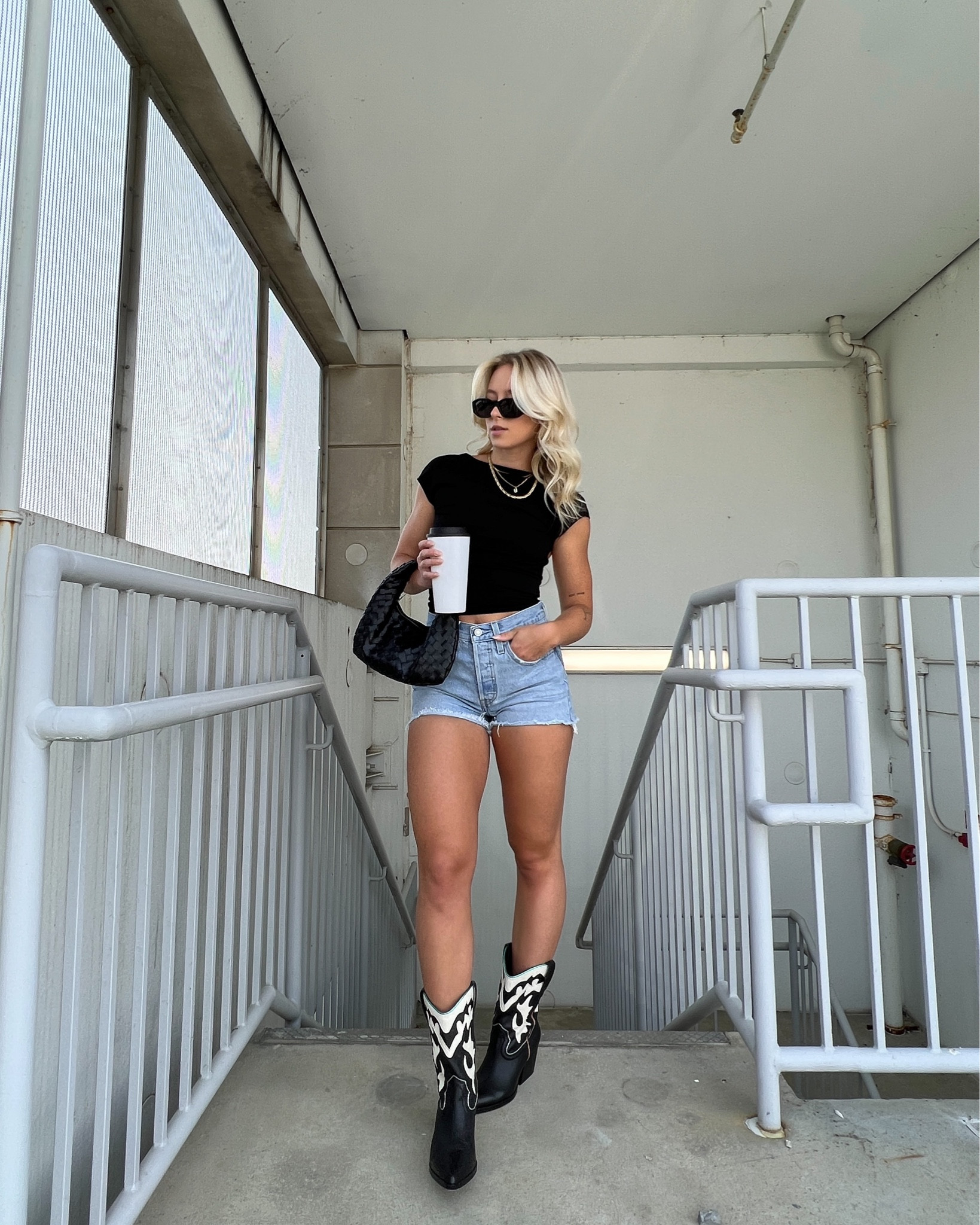 Denim shorts, short denim shorts, jean shorts, backless top, cowgirl style, cowgirl outfit, cowgirl boots, dolce vita boots, dolce vita cowgirl boots, summer outfits, summer style, summer fashion 2023
