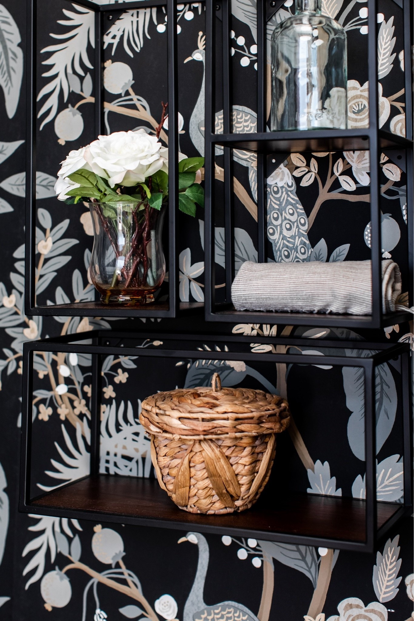 Bathroom decor for above the toilet. ➡️ Floating shelves, faux flowers, a small woven basket, and extra towels! As seen in a client’s moody powder bath. PS — how great is that Rifle Paper Co. wallpaper? 🙌🏻

#LTKHome #LTKSaleAlert