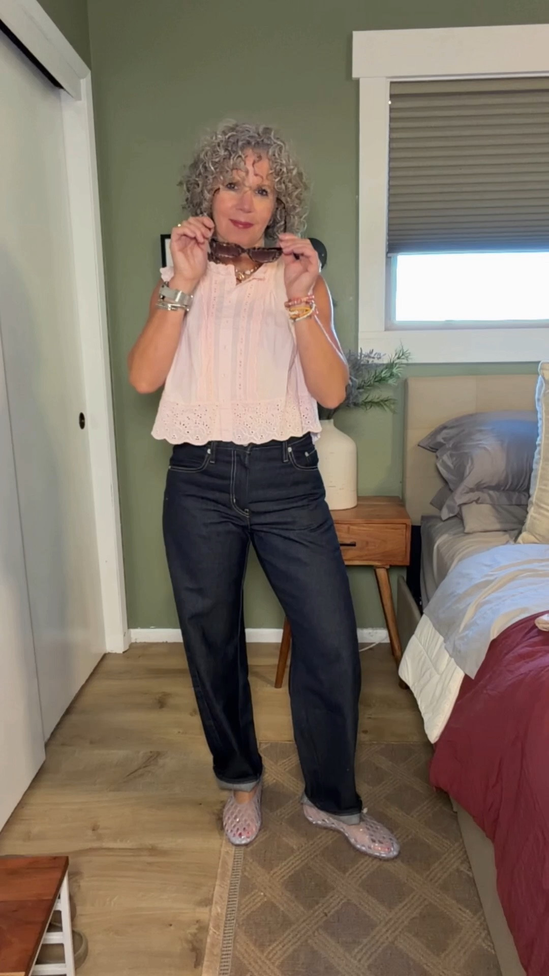 I’m in a small top
I sized down one size in jeans
Bag is older