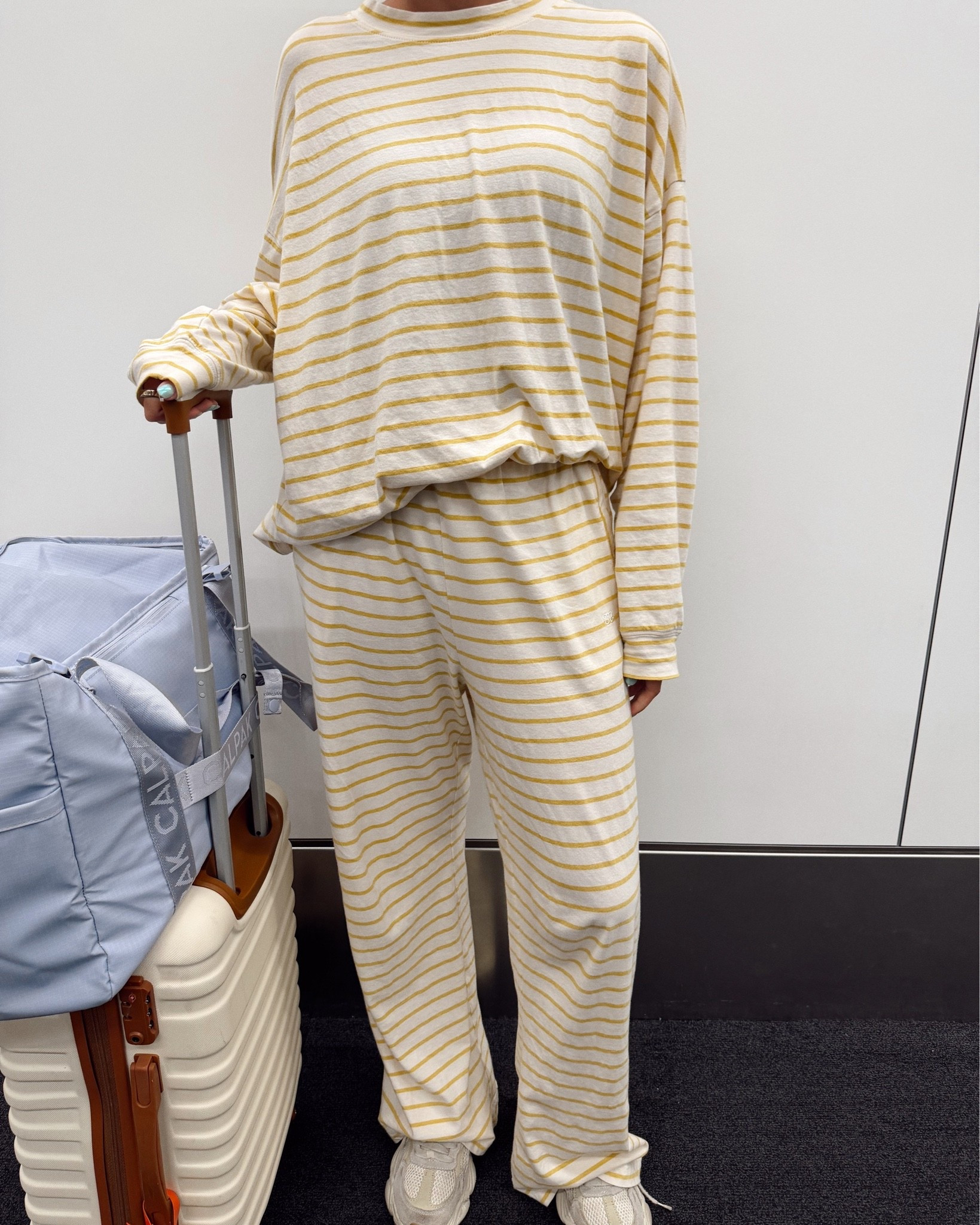 Travel ootd💛 airport outfit, striped two  piece lounge set, long sleeve pants matching set, workout outfit, cute workout clothes, travel day outfit, tropical destination, outfit ideas, outfit inspiration, active set dupe, Albion fit, athleisure

#LTKootd #LTKTravel #LTKdayinmylife