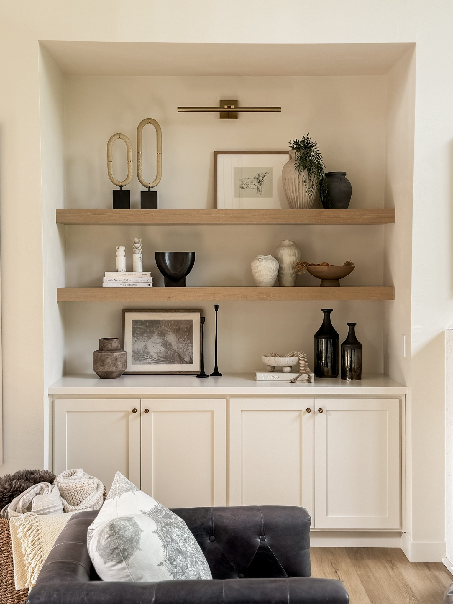 Styled with balance and warmth — a curated nook that feels effortlessly elevated. #livingroom #livingroomstyle #builtins #livingroominspo #homedecor 

 #LTKHome