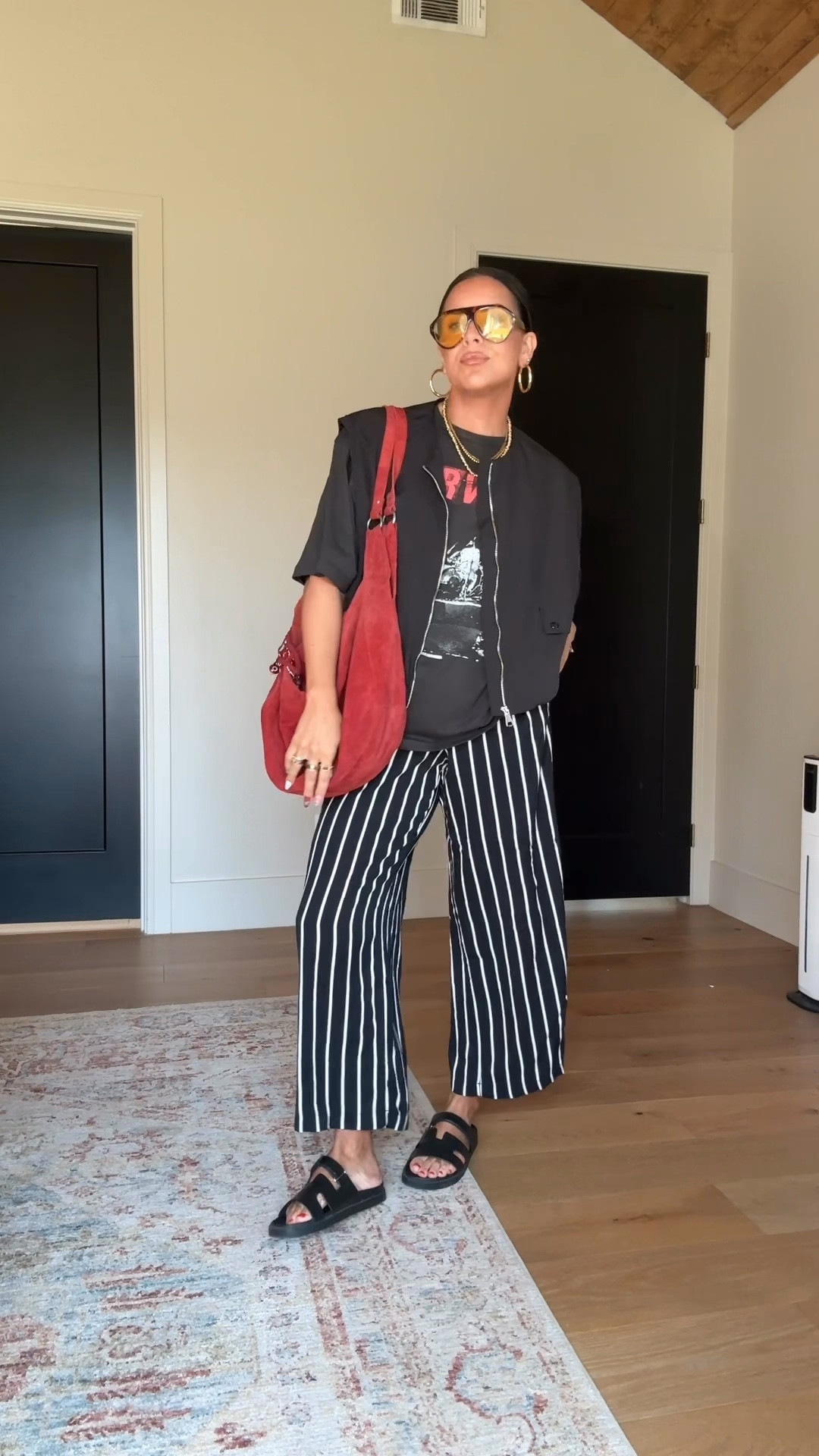 A little edgy cool mom outfit. 
Tee: XL
Pants: large
Vest: XL


#LTKmomlife #LTKMidsize #LTKdayinmylife