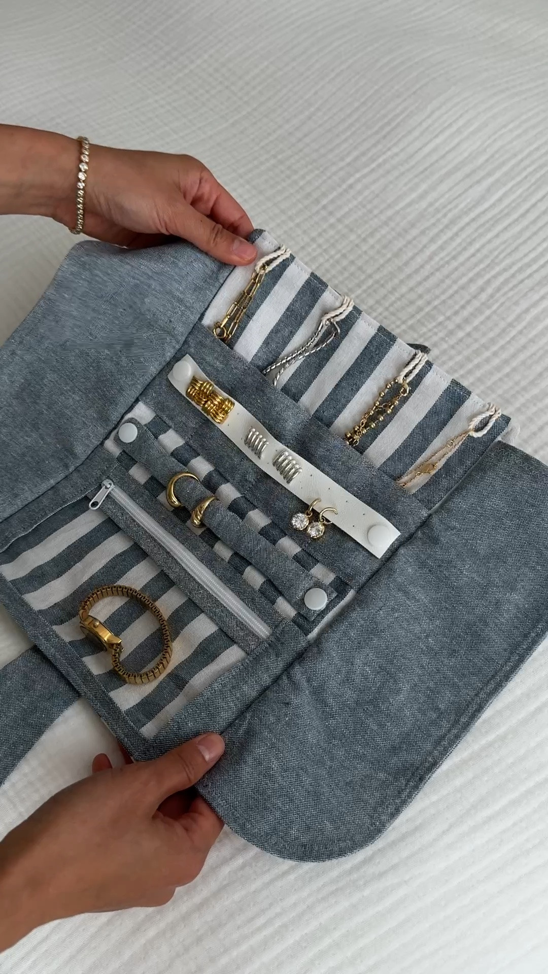 In love with this travel jewelry organizer, and it's honestly a great price for a high-quality item made by hand from a small biz! 

The Etsy seller was also the BEST to order from! She even sourced this "coastal" inspired fabric combo for me and made it available for sale. You can customize 2 earring strips or a ring strip. 

I also linked a mini smaller jewelry travel pouch I have from Amazon that I previously used. I like it as well for a very compact option, but you can't view all the pieces and necklaces can get tangled.

Travel , jewelry organization , necklace holder , new england coastal

#LTKTravel