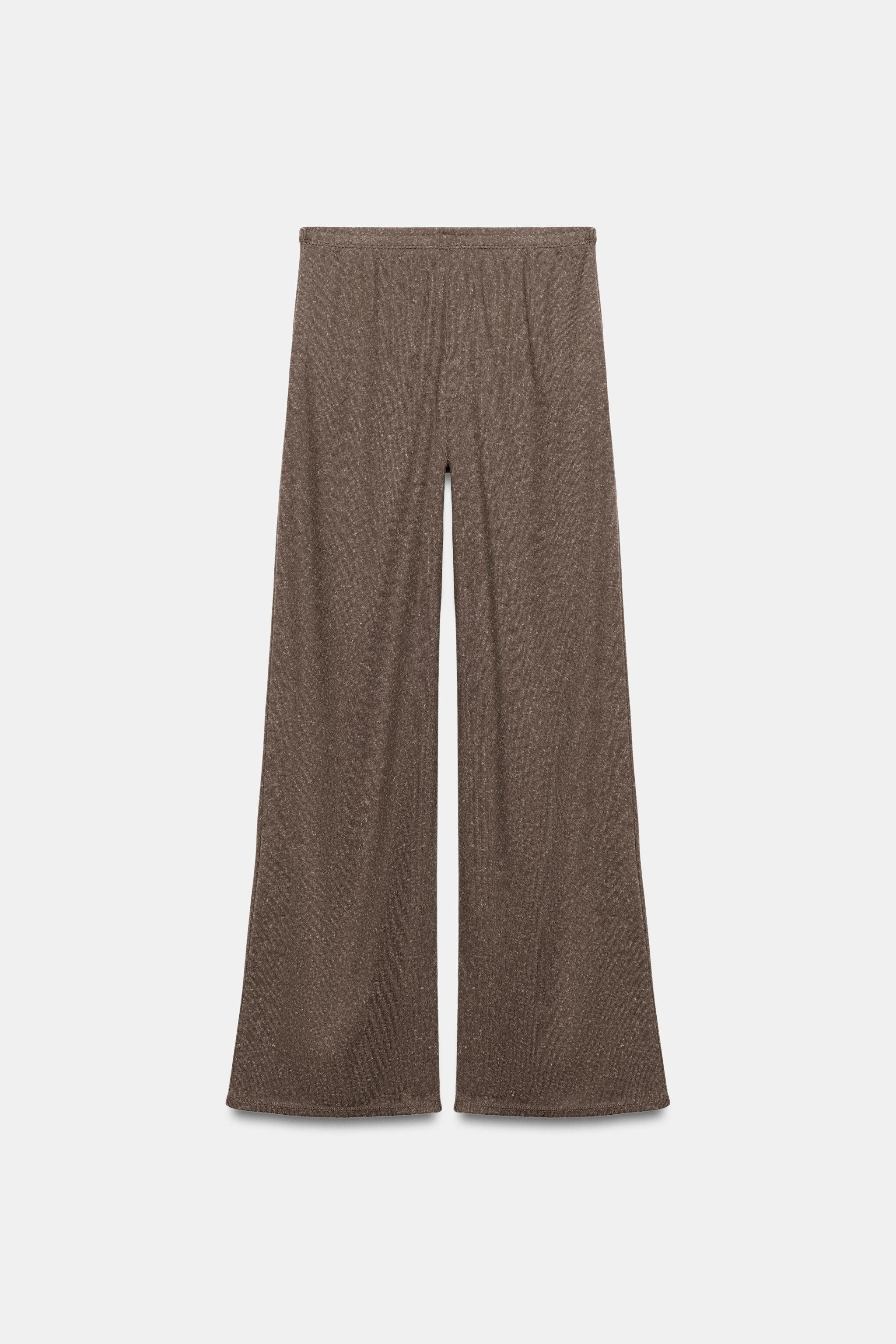 Pants made of rustic fabric. Mid-rise with elastic waistband. Straight leg. | Zara US