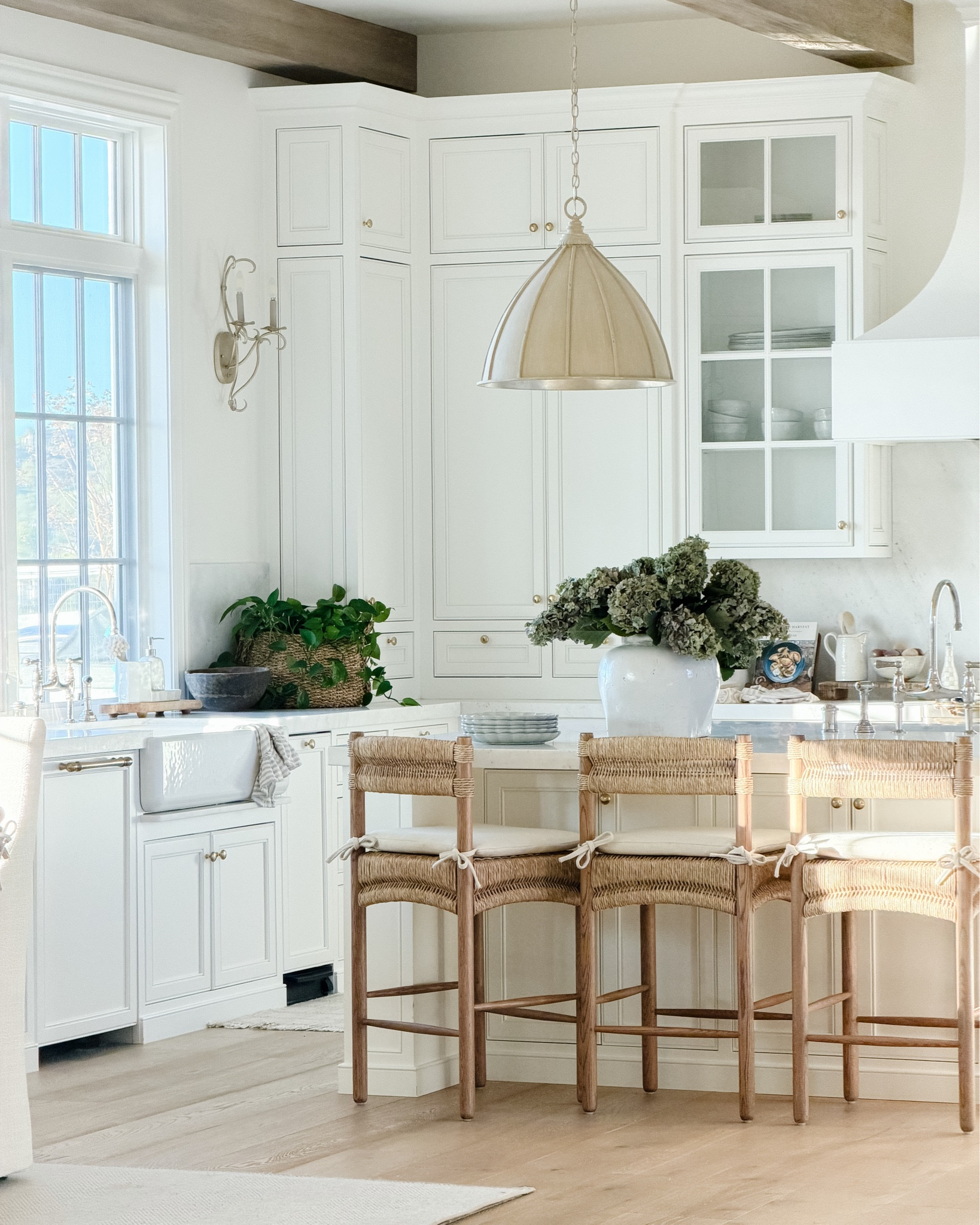 Adding in these woven counter stools have added so much texture to our kitchen!  Linking our pendant lighting, hardware, decor and of course my favorite faux hydrangeas!

#LTKSaleAlert #LTKHome