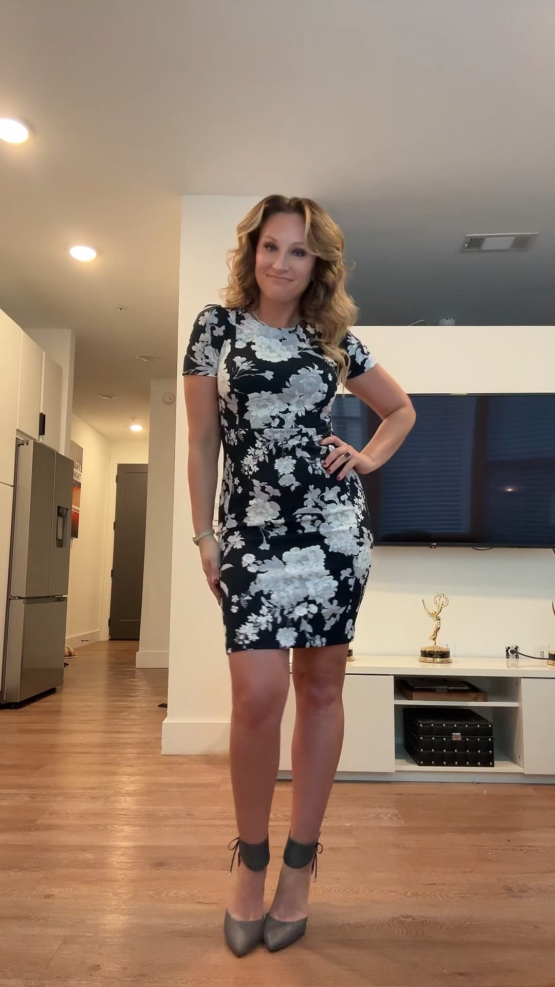 Love the #floral dress for tonight’s game! #Dress 

#LTKWorkwear #LTKSeasonal #LTKFindsUnder100