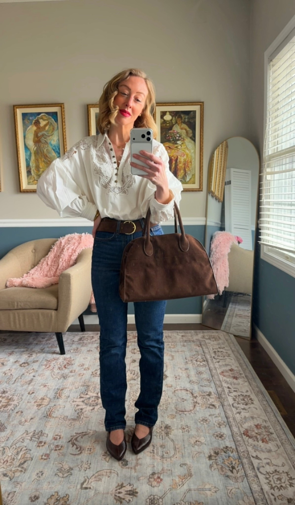 White embroidered blouse styled with classic blue jeans, a brown leather belt, pointed leather flats, and a structured brown handbag.

A timeless American outfit with soft, romantic details.

Easy everyday look for spring or transitional seasons.

#LTKootd #LTKOver40 #LTKSeasonal