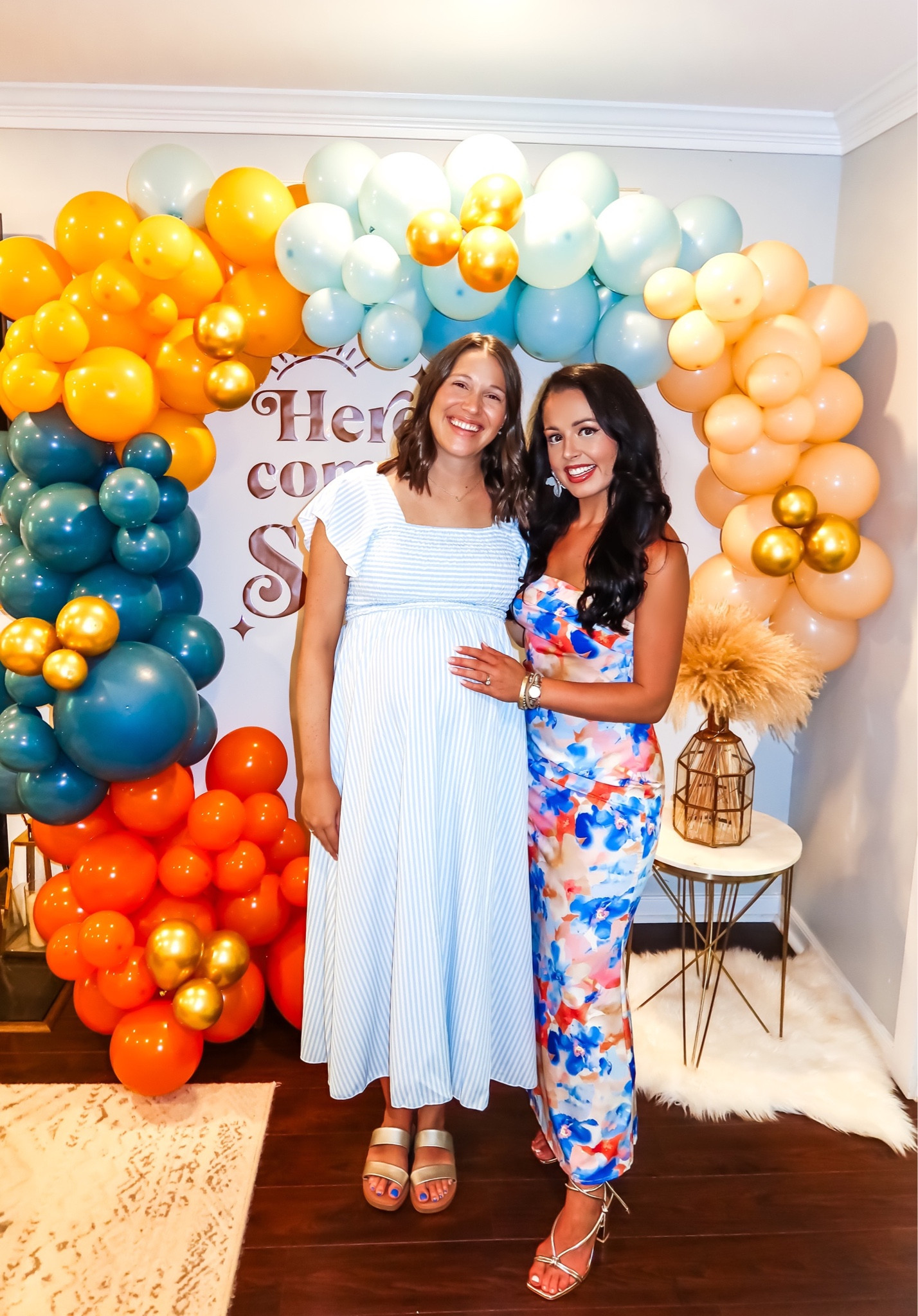 Under $35 amazon strapless floral satin maxi dress (small, 5+ colors), under $40 amazon lace up gold heels (tts), under $10 amazon blue and orange balloon garland, under $40 gold amazon arch, under $30 ivory arch cover and here comes the son gold decal —perfect baby shower accessories! #founditonamazon 

#LTKFindsUnder50 #LTKBaby #LTKParties