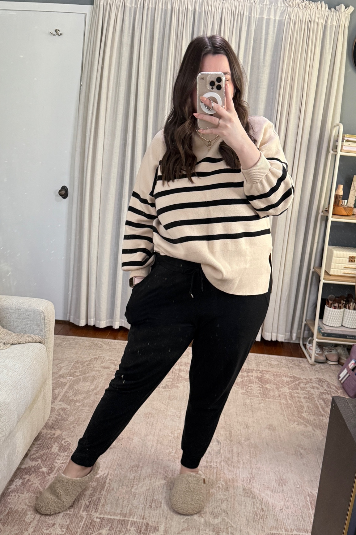 Upgrade your WFH style with this cozy, midsize-friendly outfit! 

Featuring a chic striped mockneck sweater from Amazon, comfy Target Auden black joggers with pockets, and ultra-soft fuzzy slippers from Amazon, this look is perfect for staying productive and comfortable at home. #WFHStyle #MidsizeFashion #CozyAndChic #LTKFinds

#LTKWorkwear #LTKStyleTip #LTKMidsize