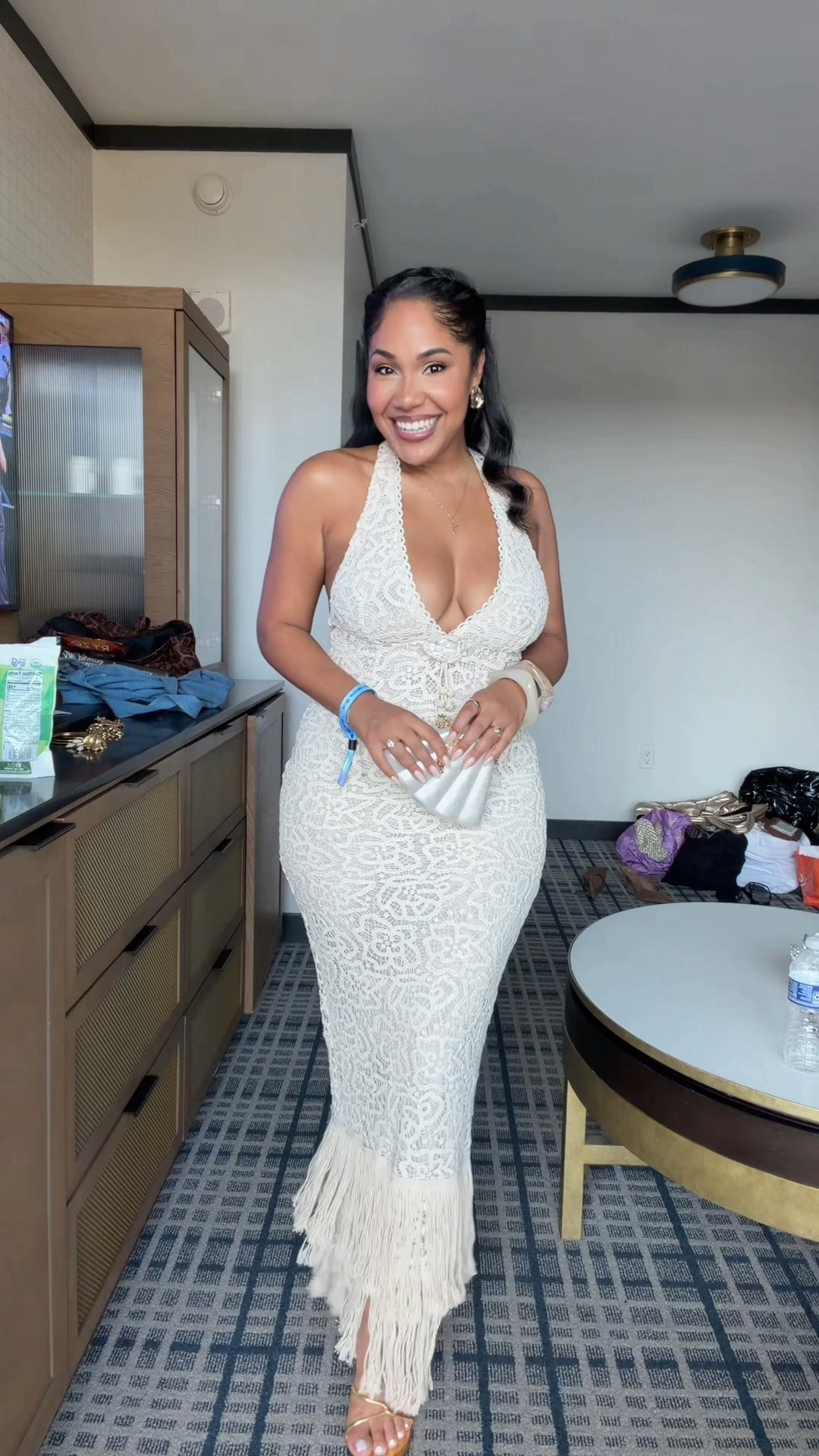 My favorite LTKCon look so far 😍🌊✨ Coastal night called for a halter moment, curves, gold accessories and ALL the bronzy, sparkly skin.

This Bloomingdale’s dress was absolutely perfect for the theme, paired with gold Topshop heels, ASOS shell earrings and a little Zara seashell bag I’ve somehow been saving for this exact moment for FOUR years. 😂🐚

For the glow, I layered Kopari all over my body for that bronzed look, then added Fenty Beauty Diamond Bomb for extra sparkle. And I did my own hair + makeup! I’m so happy with how the entire look came together. ✨

#LTKCon #LTKCon2026 #LTKStyleTip #EventStyle #CoastalStyle

#LTKCon #LTKootd #LTKCon #LTKgrwm