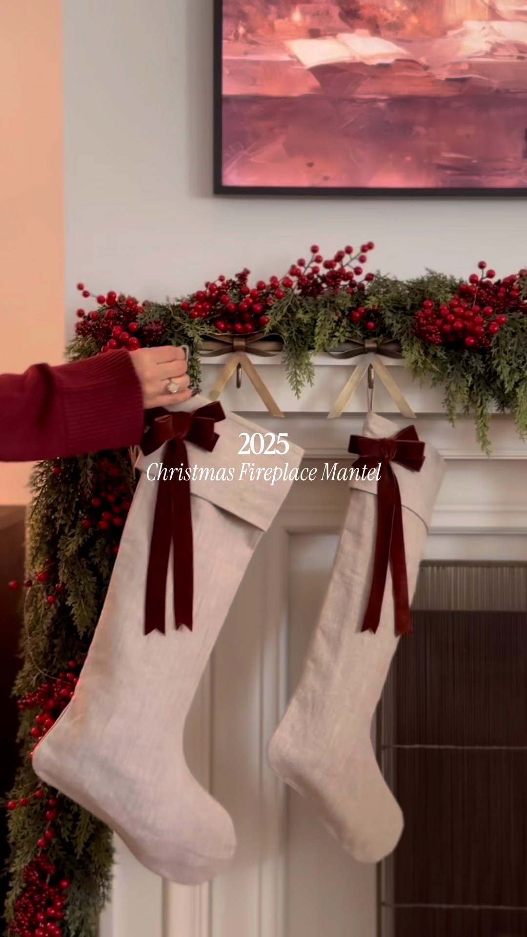 My Christmas mantel reveal is here! ❤️🎄🕯️Brought back my favorite garland and berry picks from last year and refreshed the details with the prettiest stockings and stocking holders from @luluandgeorgia. 
It feels so warm, inviting, and nostalgic in here. I hope you loved it as much as I do and that it inspires you for your own holiday decorating 🥰 

Comment mantel below and I’ll message you all the links to shop! 

#christmasmantel #cozychristmas #holidaydecor #christmasdecor #festivehome #christmasreveal #manteldecor