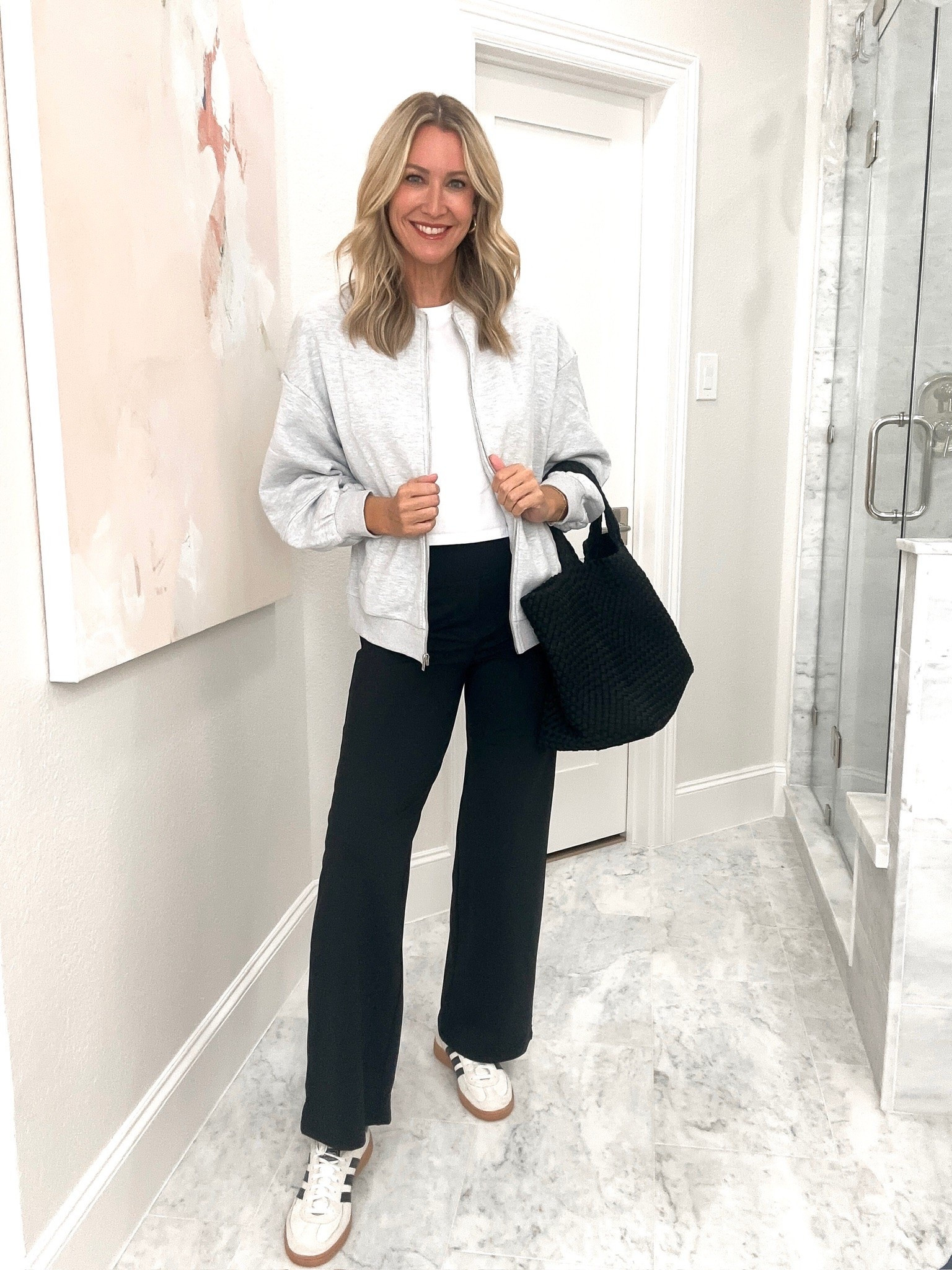 This is my kind of throw on and go outfit. The lightweight jacket and wide leg pants are comfortable enough for a busy day, but still feel pulled together with sneakers and a roomy tote.

lightweight jacket, wide leg pants, casual outfit, everyday style, sneaker outfit, transitional outfit, neutral style, comfortable outfit, casual layers, women’s fashion, everyday outfit, hauteandhumid

#LTKootd #LTKSeasonal #LTKOver40
