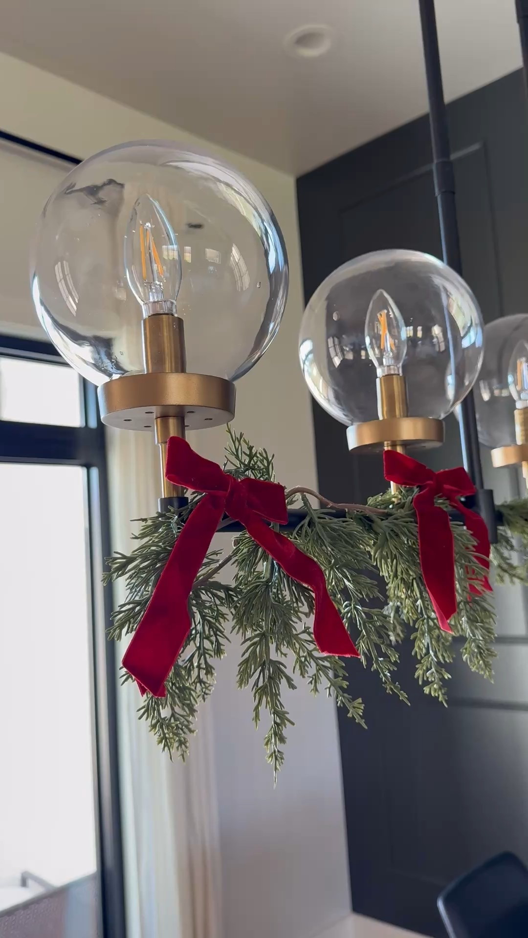 Styling our dining room lights for the holidays! Of course there are bows! 



#LTKSeasonal #LTKHoliday #LTKHome