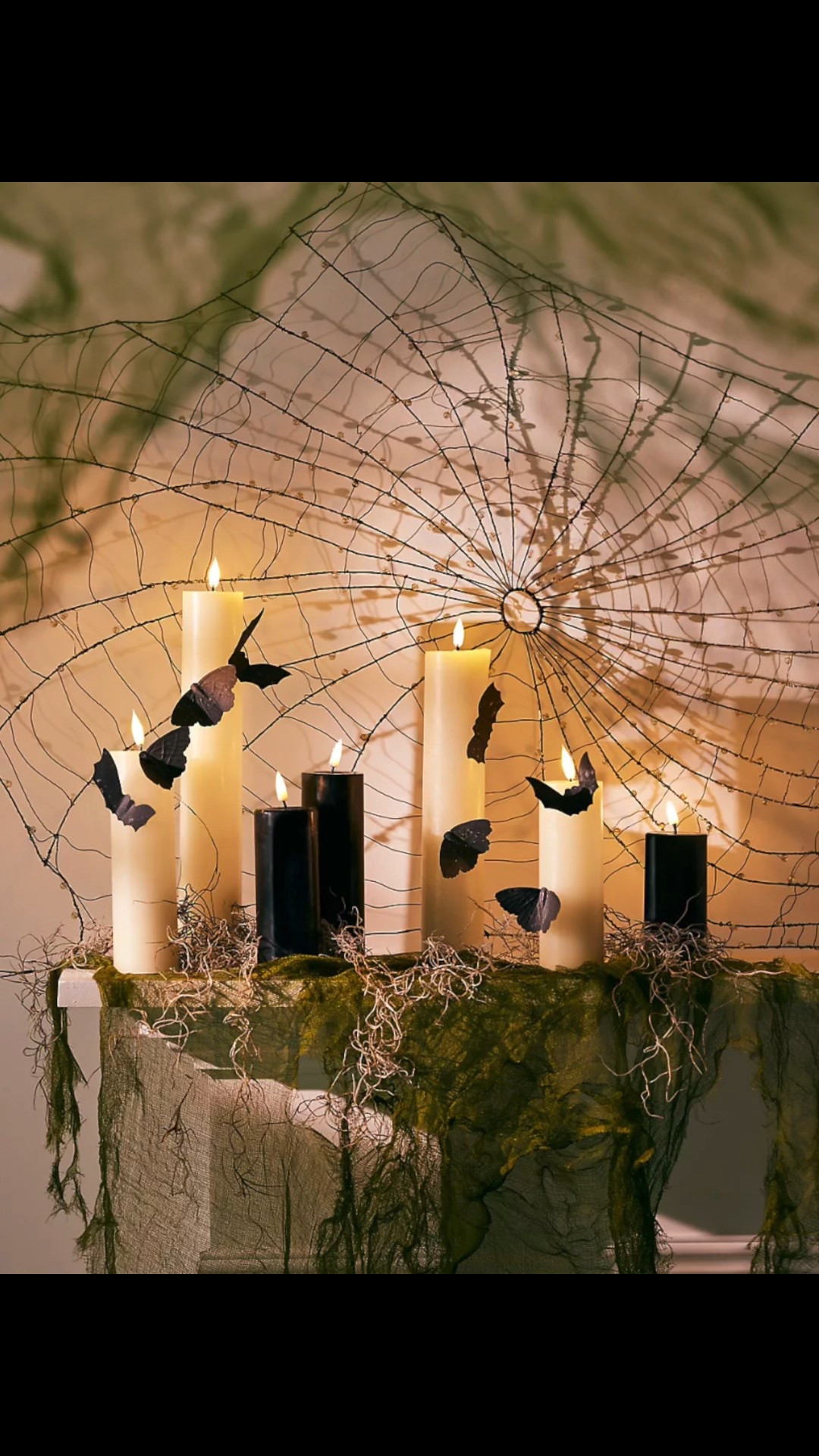 This large scale iron wire web is accented by glass beads.  It’s a frightfully bold accent for your Halloween home.  Perfect for hanging over a mantel or in a window!  

#LTKSeasonal #LTKHome #LTKautumn