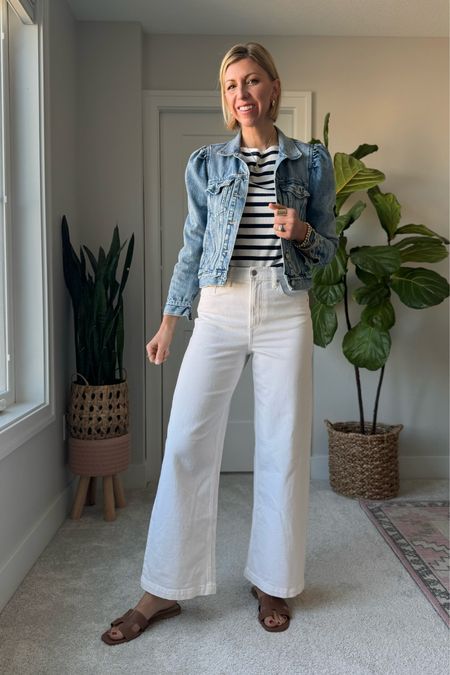 Elevated, easy spring outfit! White wide leg jeans, stripe tee, denim jacket + leather slides! 

I’m wearing a small in the stripe tee, medium in the jacket & size 28 tall in the jeans 

#LTKVideo #LTKover40 #LTKfindsunder50