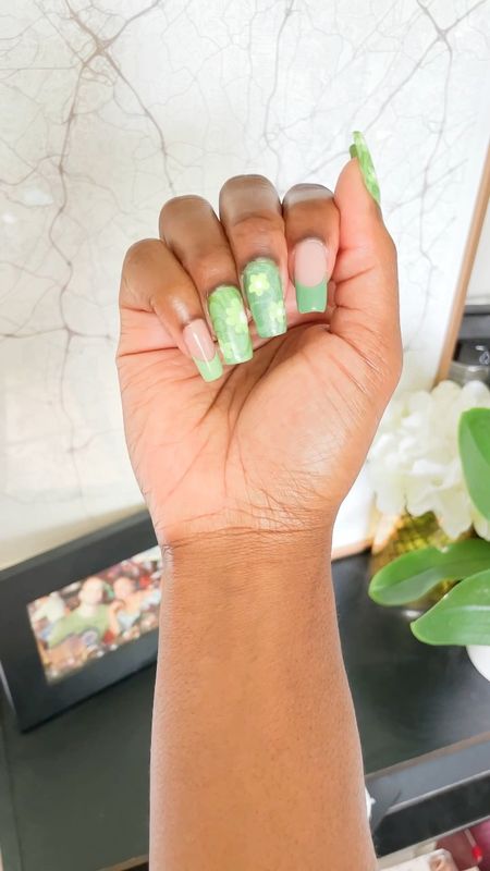 💚🌼 Groovy Green Floral 🌼💚

In love with the way this mani turned out! 😍💚 I want to doing something with my favorite color green again and wanted to give nail art stamping another go. This first couple of times were an epic fail. Stamping is much harder than it looks! 😅
I layered this nail design by doing a swirl stamp design, then added a holographic polish on top, than stamped with a few groovy flowers. I listed the products I used below if you like to partake in fun DIY Nails or just love doing your nails at home.

#LTKstyletip #LTKbeauty