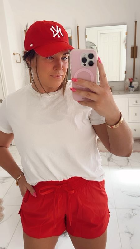 curvy athleisure look! wearing size xl in white tee and size large in red lined shorts 

#LTKMidsize #LTKActive #LTKFitness