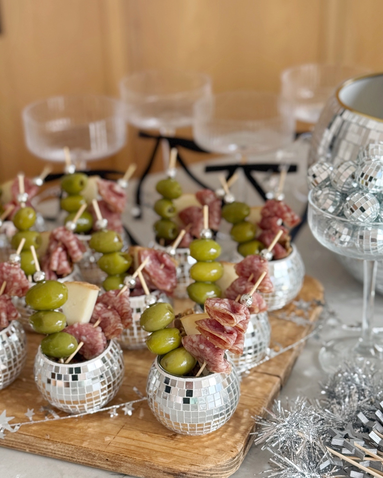 The perfect NYE party setup! Mini disco ball charcuterie cups and champagne!🪩🍾 Ring in the new year in the most festive way!!💫👯‍♀️

#LTKHoliday #LTKHome