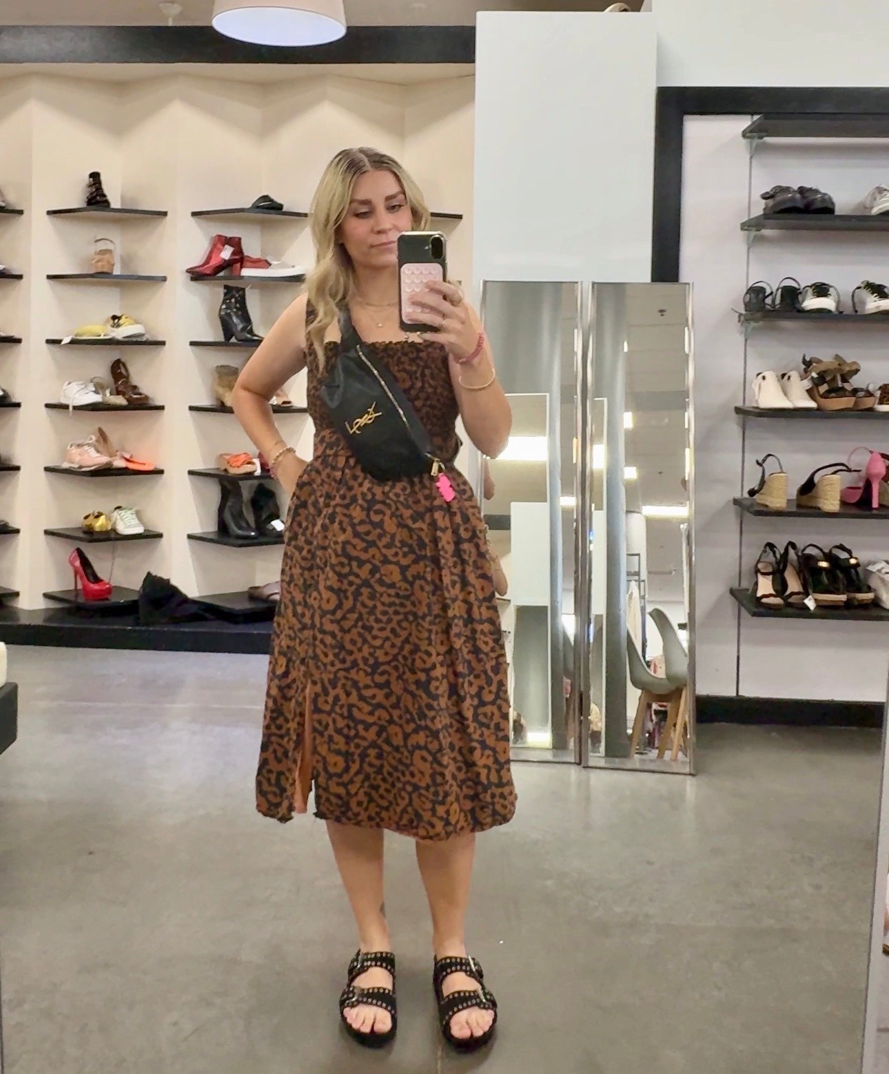 Off-duty baddie style 🐆 Combining the leopard print trend with edgy black accessories is my current obsession 🖤This smocked midi dress is so lightweight and flattering, it’s one of my favorite pieces for the summertime! Let’s also not forget my fav sandals that I wear, literally every day, as well as my Saint Laurent belt bag, that’s perfect for hands-free errands with the kiddos in tow.

#LTKootd #LTKmomlife #LTKdayinmylife