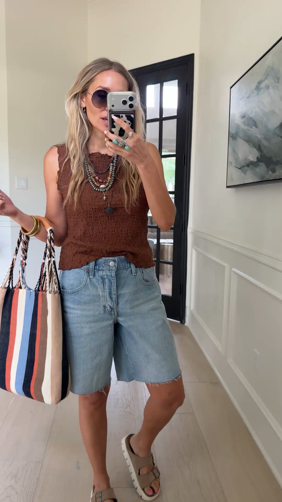 🤍 Old navy is CRUSHING it— longer jorts that are giving Deisgner vibes & their smocked tanks!!!! 

Wearing my tts in both 

5’5” | 120 lbs | size 4/27

#LTKgrwm #LTKmomlife #LTKootd