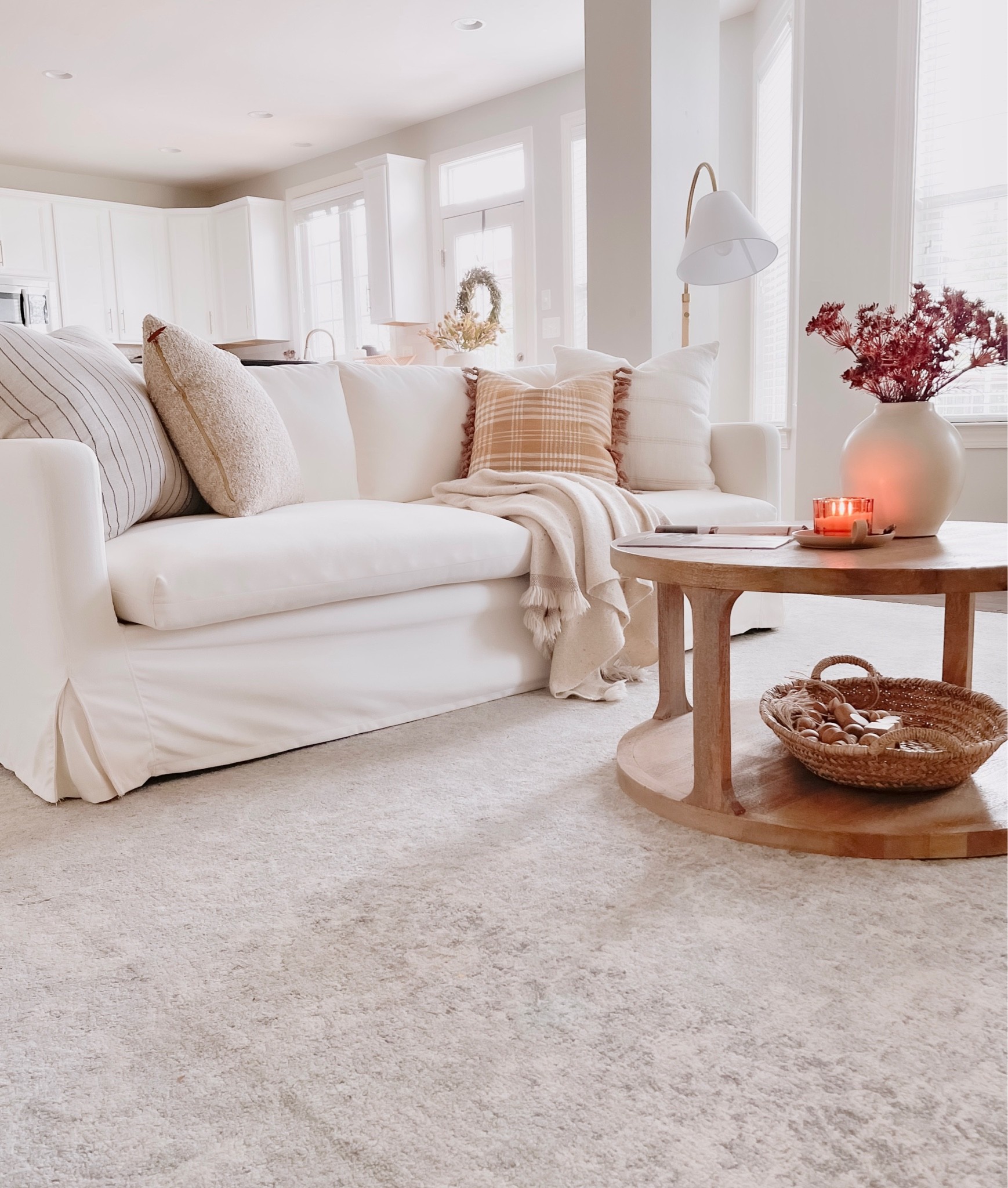 Fall living room decor 🍁

White sofa, white kitchen, round coffee table, fall pillows

#LTKhome #LTKSeasonal