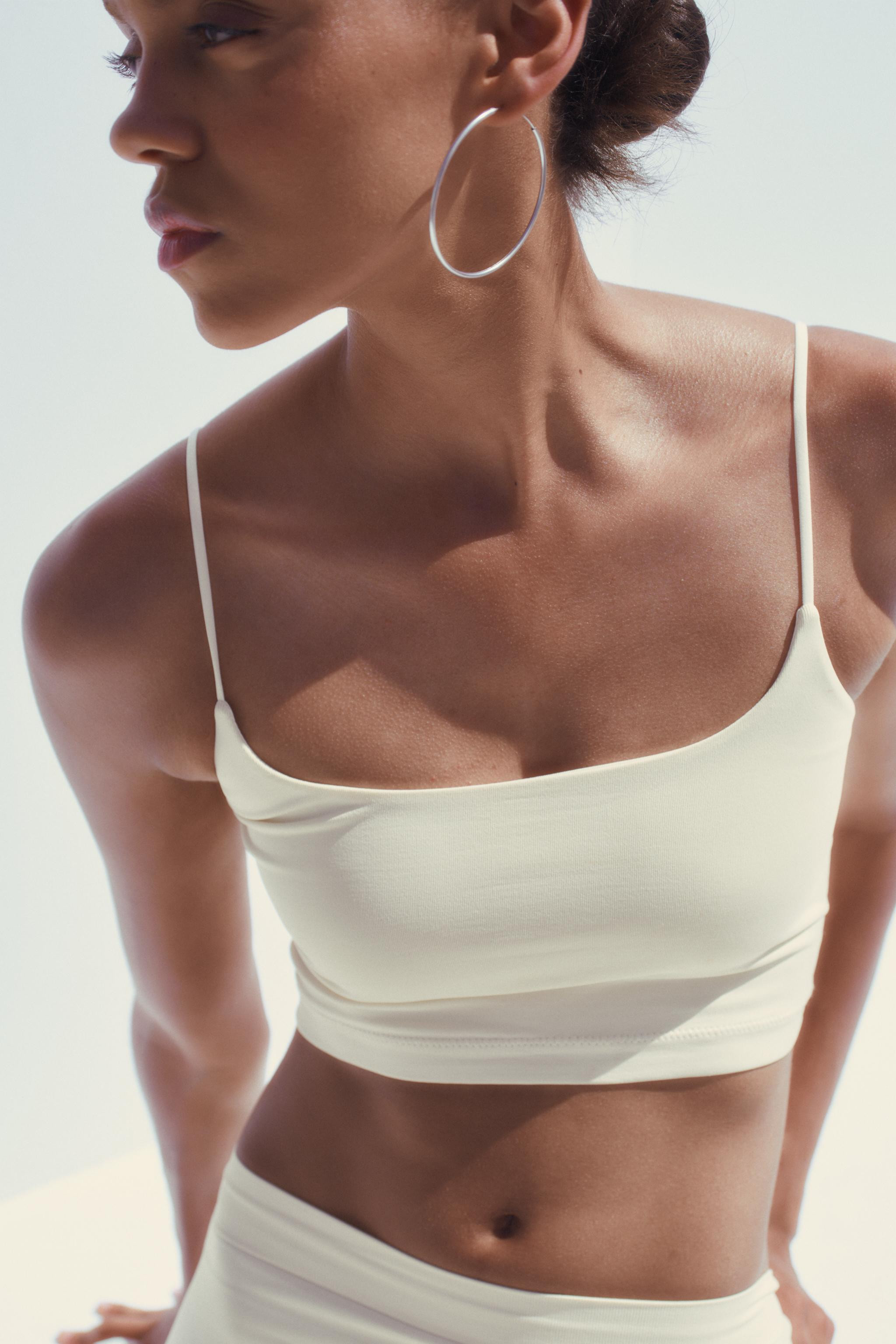 SEAMLESS CROP TOP$ 19.90 White Black WineWhite | 5063/316/250Add to cartAddRound neck crop top wi... | Zara US