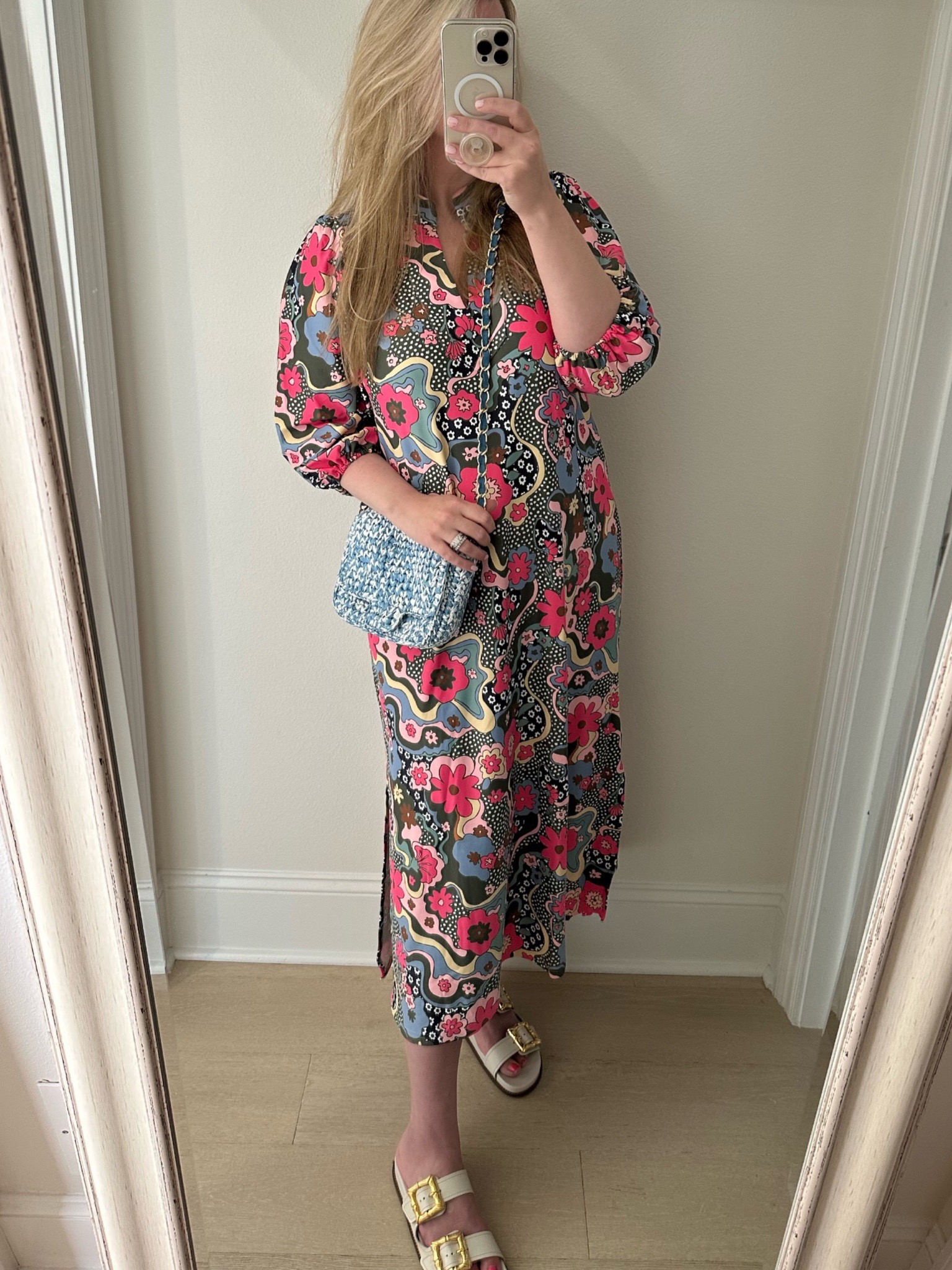 Dress runs a bit big, size down if between sizes. Slides are true to size.

