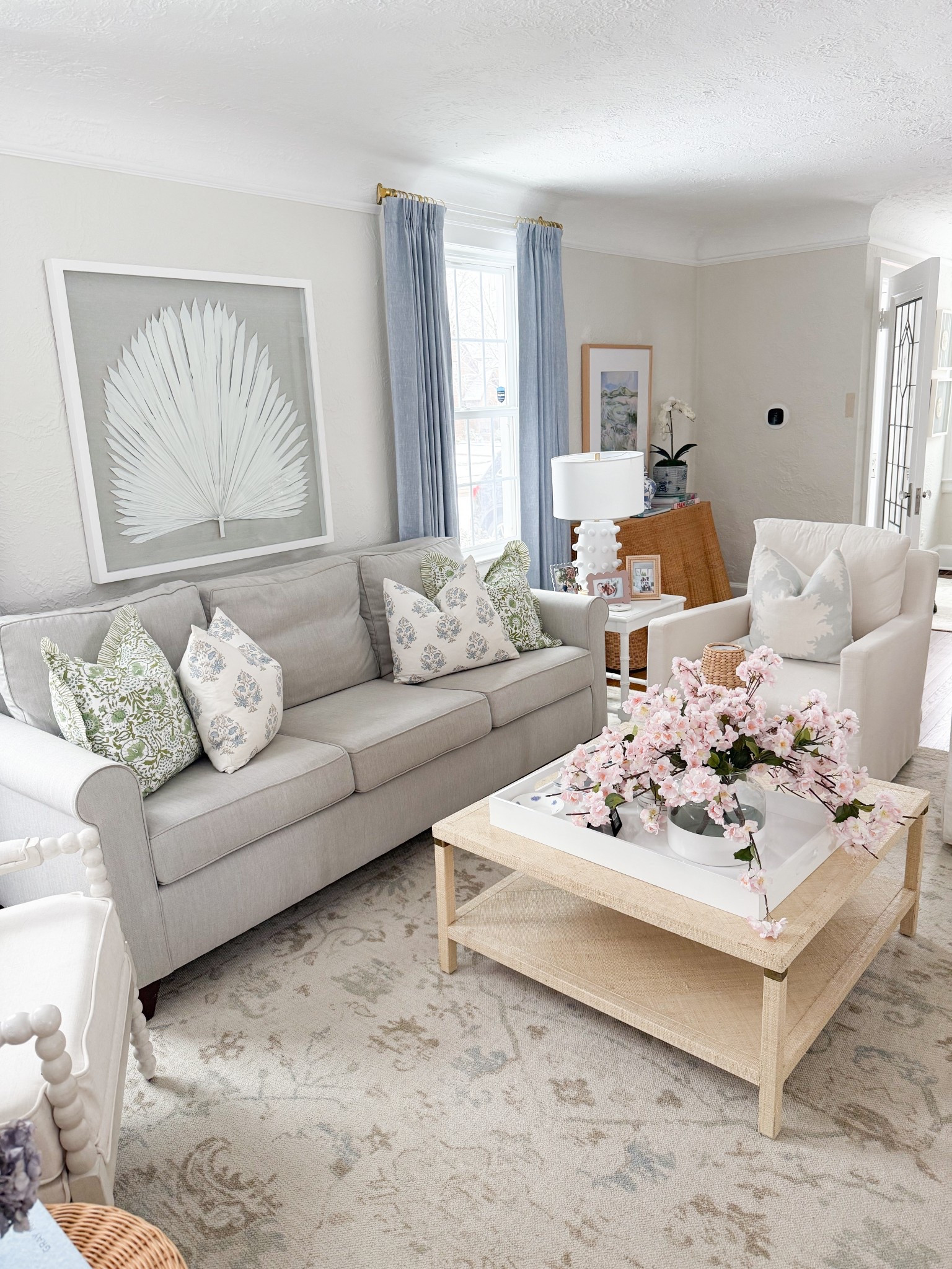 Coastal traditional living room. Love how these pinched pleat light blue curtains transformed the space 

#LTKHome #LTKFindsUnder50 #LTKFindsUnder100