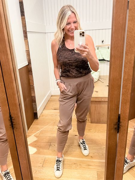 Love these athleta beige joggers with a brown and black floral tank top and golden goose. Size small joggers and tank. Both come in other colors. Activewear casual fall outfit ideas 

Follow my shop @thesensibleshopaholic on the @shop.LTK app to shop this post and get my exclusive app-only content!

#liketkit 
@shop.ltk
https://liketk.it/3OTsq

Follow my shop @thesensibleshopaholic on the @shop.LTK app to shop this post and get my exclusive app-only content!

#liketkit #LTKfit #LTKstyletip #LTKSeasonal
@shop.ltk
https://liketk.it/3OTux
