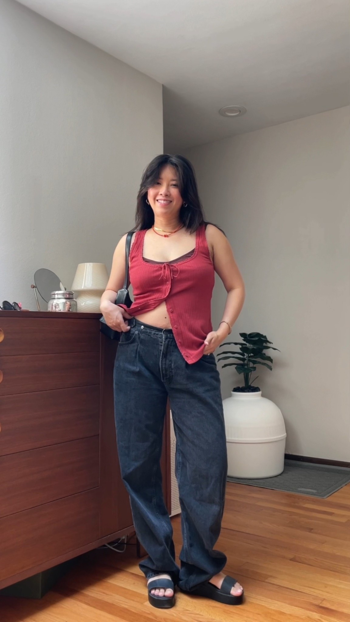 Quick little date night ootd ❤️ obsessed with this tank top! So affordable and comes in so many diff colors! Wearing size M for reference 

Follow @lazzzysundaze for more outfit inspiration 

Date night outfit, summer outfit, spring outfit, summer fashion 2025, get ready with me, grwm, ootd, aerie tank, baggy jeans, cool girl outfit, mom outfit, casual style, agolde jeans, crocs 

#ootd #grwm #outfitreels #summeroutfit #coolgirlstyle #casualstyle #momoutfit #crocssandals

#LTKStyleTip #LTKFindsUnder50 #LTKSummerEdit