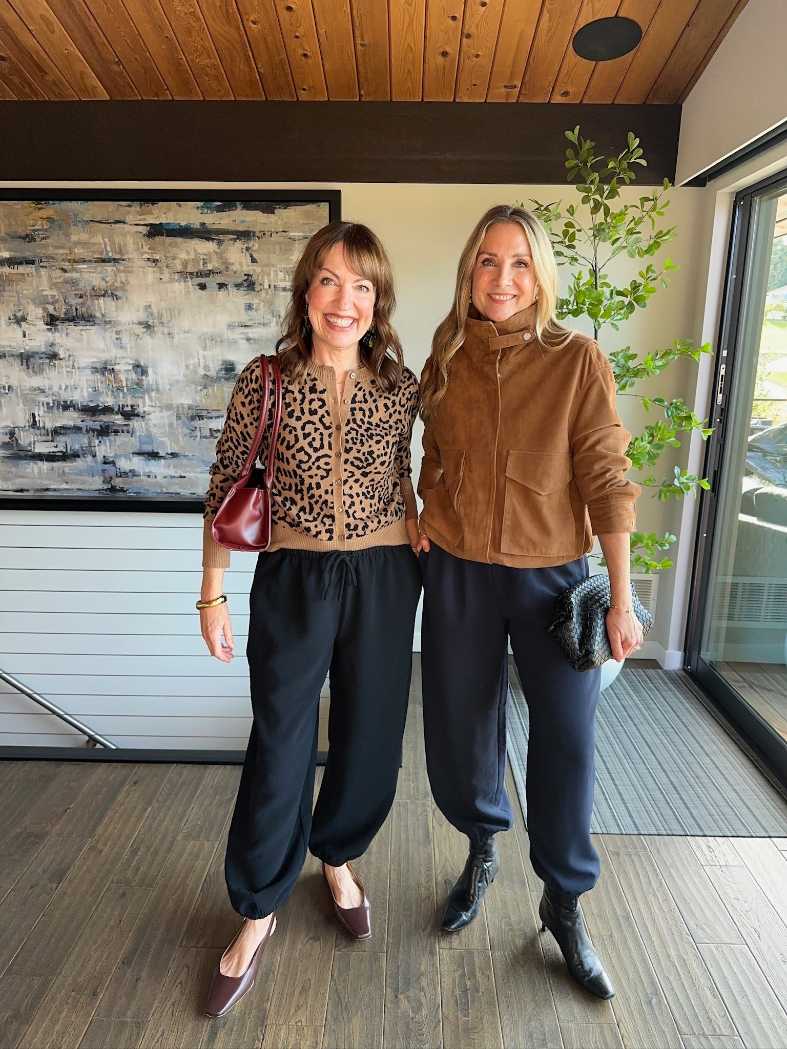 I’m a definite “yes” for these viral @Aritzia balloon pants! Julie was a “maybe” at first, but after styling them 3 ways, she’s a fan!!👌🏻 It’s fun to have a pant you can dress up or down, and this crepette material refuses to wrinkle. So comfy, too! Ours are black and navy, but they come in several colors. Are you a fan of this trend? Balloon pants, zebra print, @Spanx , quarter zip top, date night outfit, bubble top, suede jacket, suede flats, @Quince bag, cardigan, @Melie Bianco bag