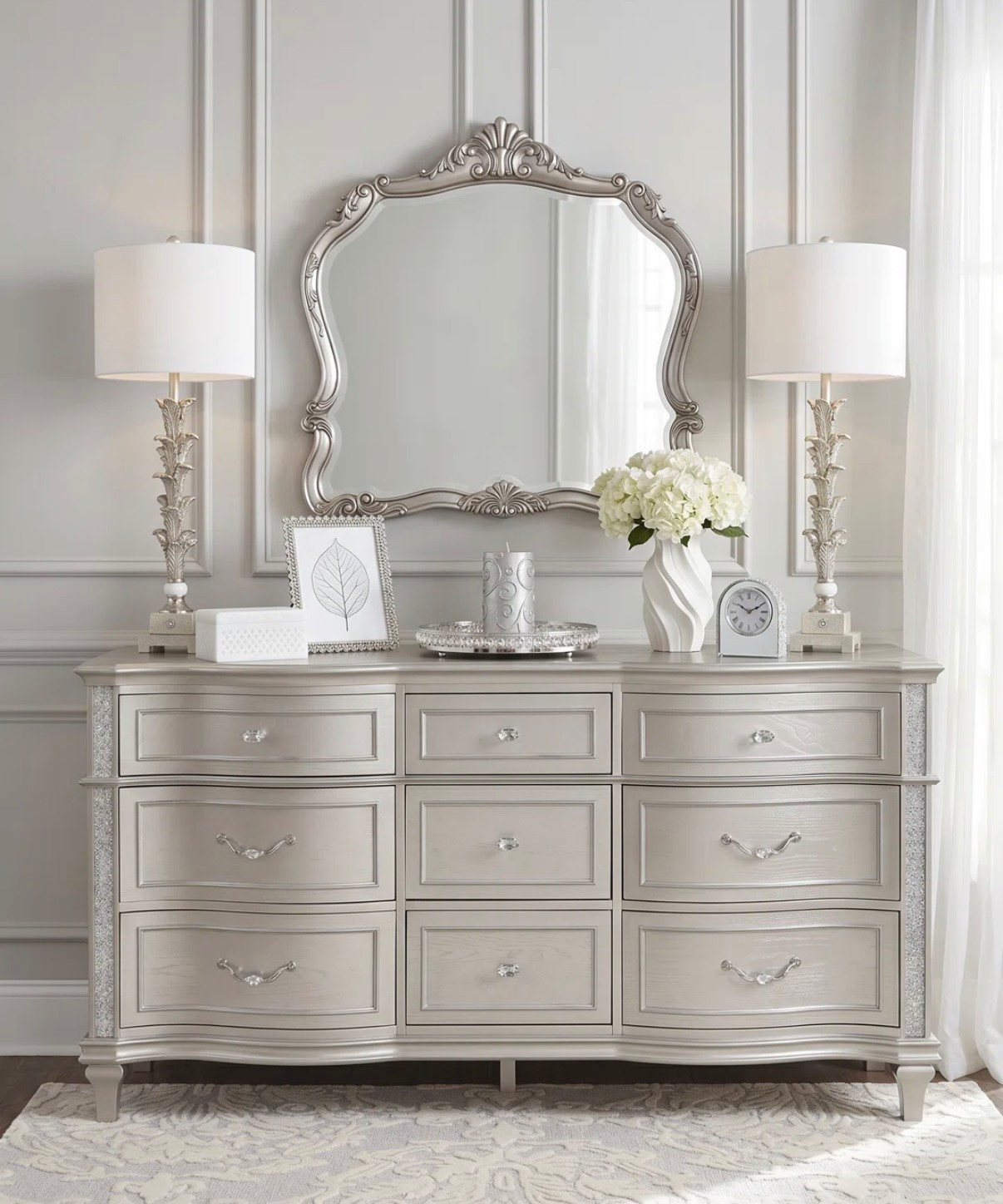Soft glam bedroom goals ✨ This elegant silver dresser and mirror set brings timeless sophistication to any space. From the crystal hardware to the ornate details, every piece feels luxurious and serene. 🤍 Perfect for creating a bright, feminine retreat you’ll love waking up in. #LTKHome #BedroomDecor #GlamBedroom #NeutralDecor #ElegantHome

#LTKmorningroutine #LTKHome