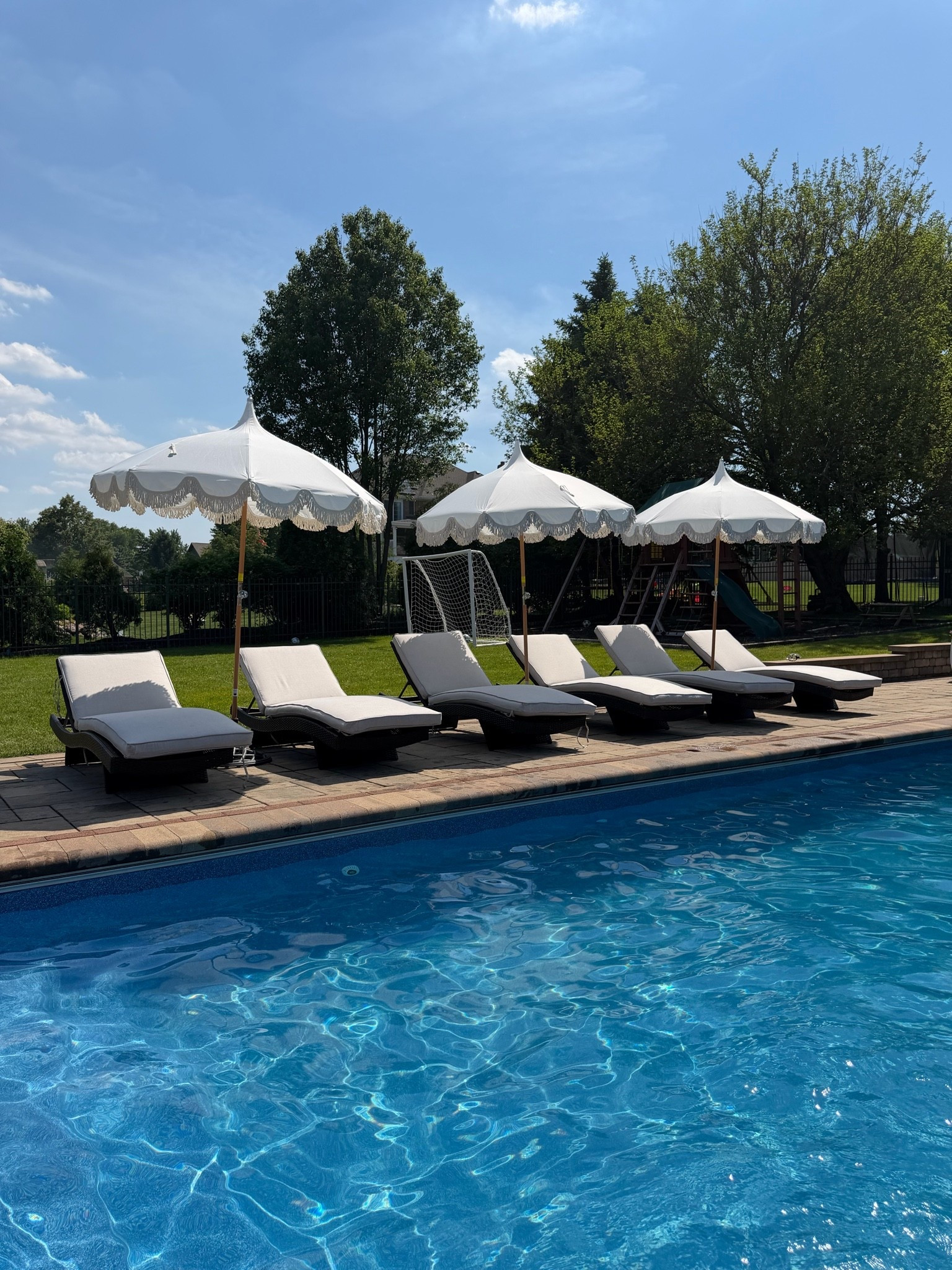 Our backyard is slowly becoming the summer oasis I always imagined ☁️✨
The umbrellas, cushions, and stands are finally on sale — and they completely changed the feel of this space. Resort-inspired without leaving home 🤍

#LTKHome #LTKSeasonal
