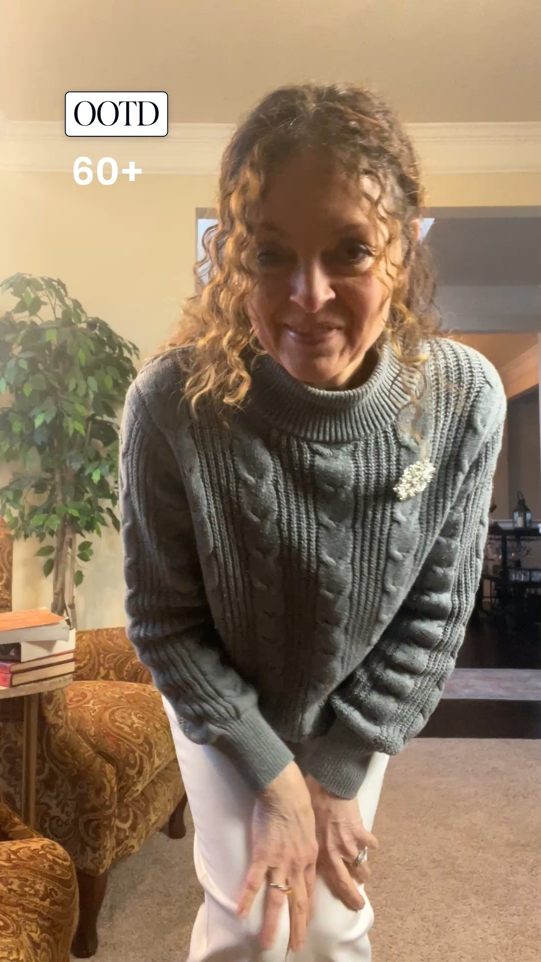 #ootd for us 60+ gals. Headed to church, so took the opportunity to wear my cream @whitehouseblackmarket pants and a grey cable knit sweater, and of course, the snowflake. ❄️ pin. 
I had on some tan booties that have the exposed toe, and due to the chilly morning actually ended up swapping them out for my gray flannel flats with the cute tassel

I’m 5’‘2“ and these White House black market pants in size 4  are a little loose for me. They are intended to be shorter for most women but they come to my ankle. 🙂
The sweater is a small and you can see it is long on my short frame.

#LTKOver40 #LTKPetite #LTKootd