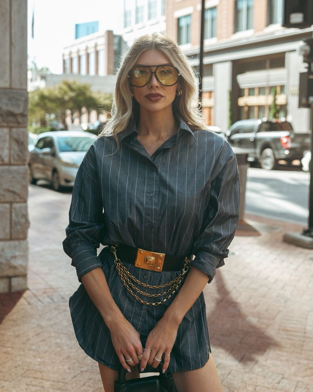 Standing on business 💼 When you mean business, but with a side of spice. My charcoal pinstripe shirt dress is Enza Costa, I linked an exact one from Poshmark and some similar looks. My AllSaints over the knee leather boots are a staple, linked similar styles from this season. My Chanel mini Kelly shopper will definitely be a bag I pass down to my daughter. My sunglasses are from Amazon and definitely give Bottega vibes. 🖤

#LTKFindsUnder100 #LTKSeasonal #LTKShoeCrush