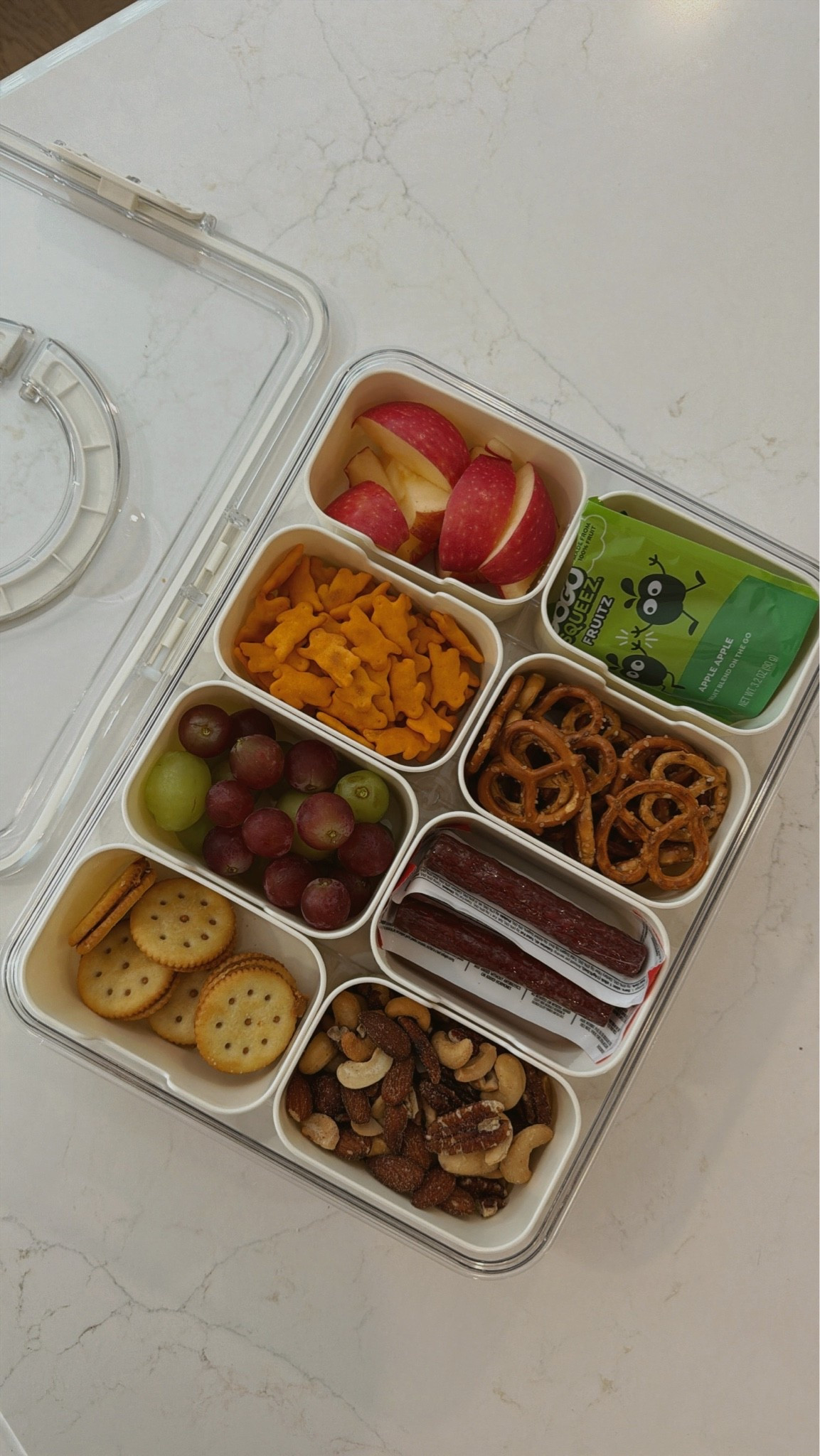 We love this snackle box and are taking it every where with us from the pool and lake to the beach this summer!

#LTKSeasonal