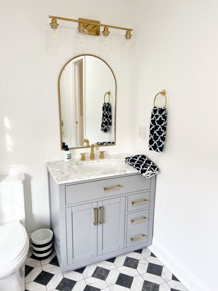 Bathroom vanity, mirror, bathroom hardware, light fixture 

#LTKhome