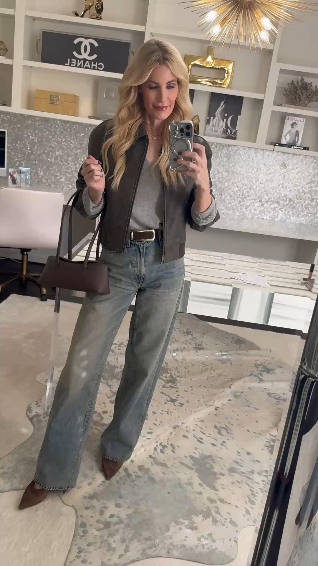 SALE ALERT!! >>> A gray faux leather bomber = the ultimate cool-girl wardrobe staple 🤍 This one is 50% off right now, which makes it even better. I layered it over this fabulous gray cashmere sweater—another must-have that will go the distance in your winter wardrobe. It’s from Quince, so you’re getting real cashmere at an incredible price (we love a luxe look that makes sense). Finished the look with these high-waisted wide-leg jeans—I’m obsessed with this unique wash. Effortless, flattering, and so easy to style. ✨ Fit notes: everything runs true to size – Jacket: XS – Sweater: XS – Denim: size 24  

 

#LTKOver40 #LTKSaleAlert #LTKFindsUnder100